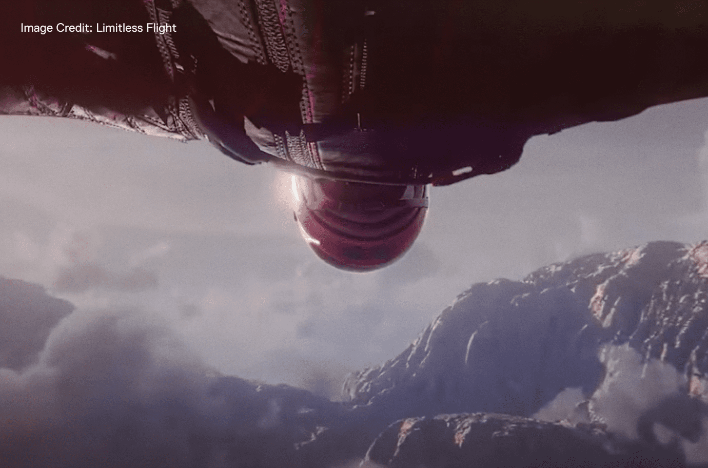 person gliding over mountain VR scene