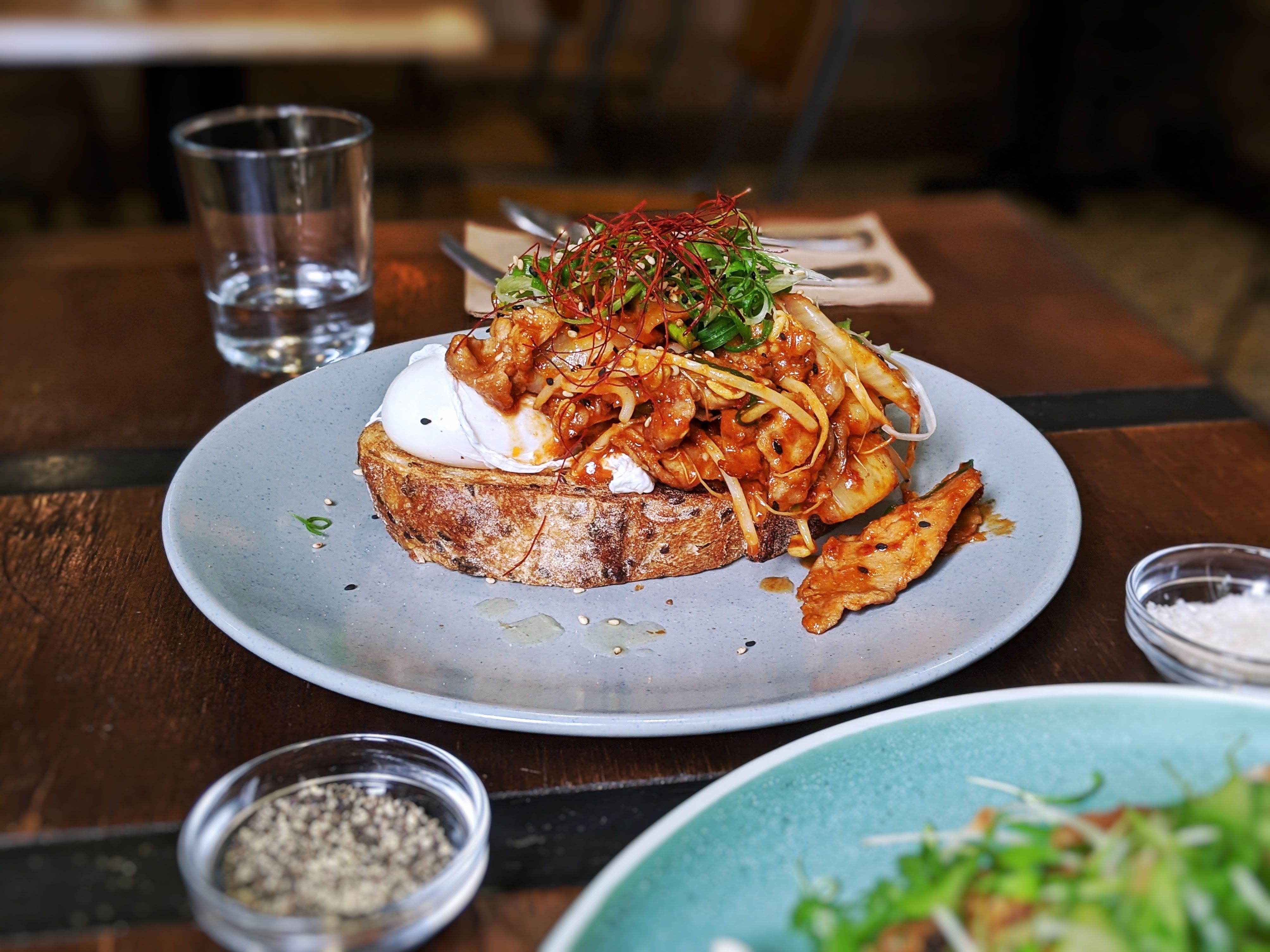 Spicy Buta n Kimuchi Toast + poached eggs ($18.5) 