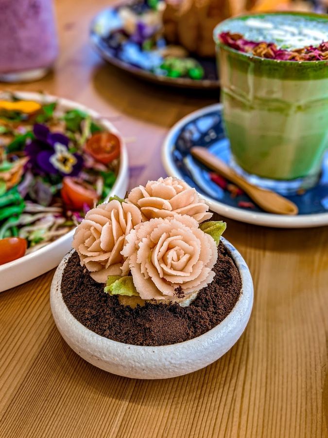 Cupcake decorated with pink flowers