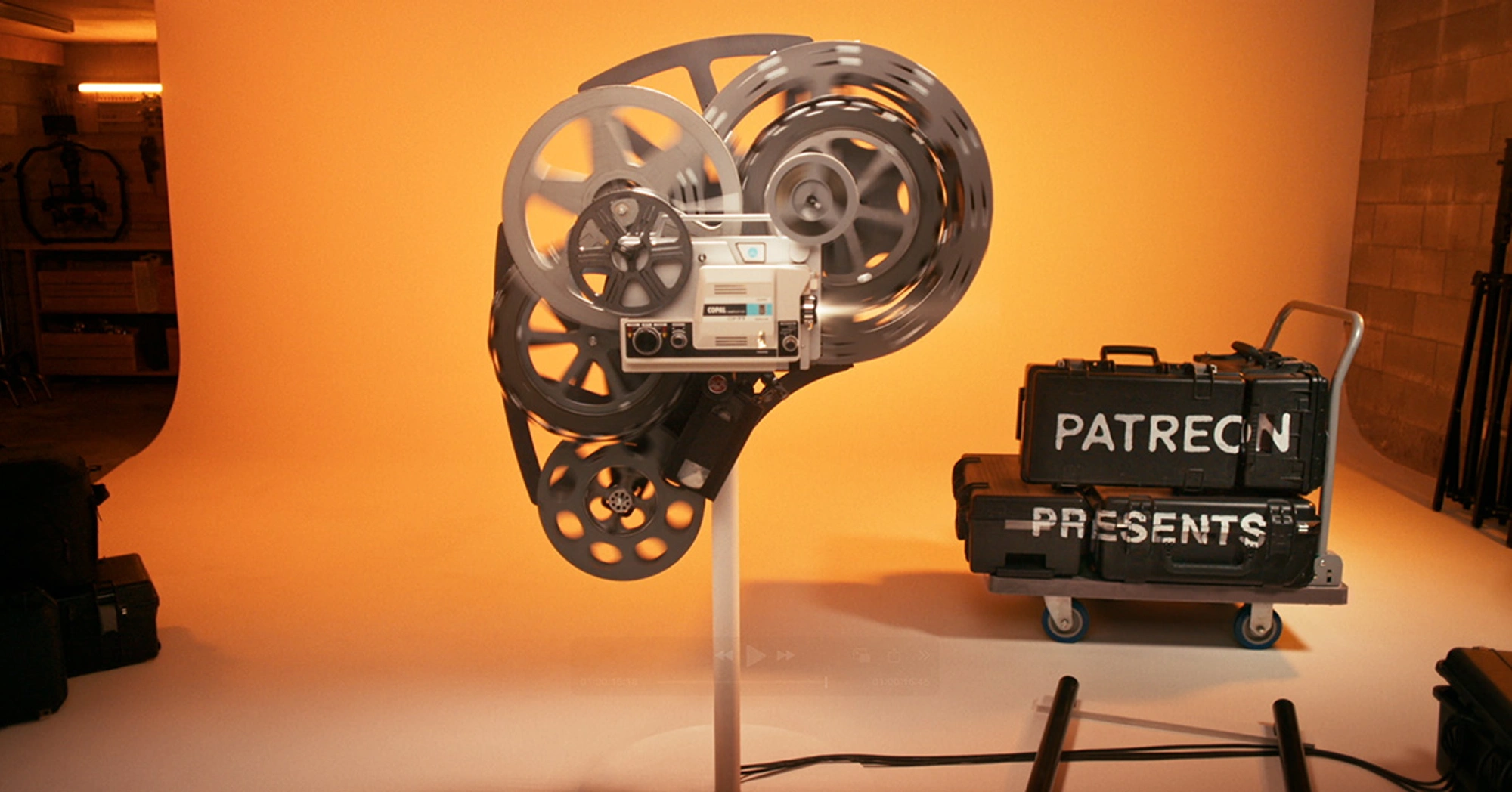 Patreon logo made up of old projector parts