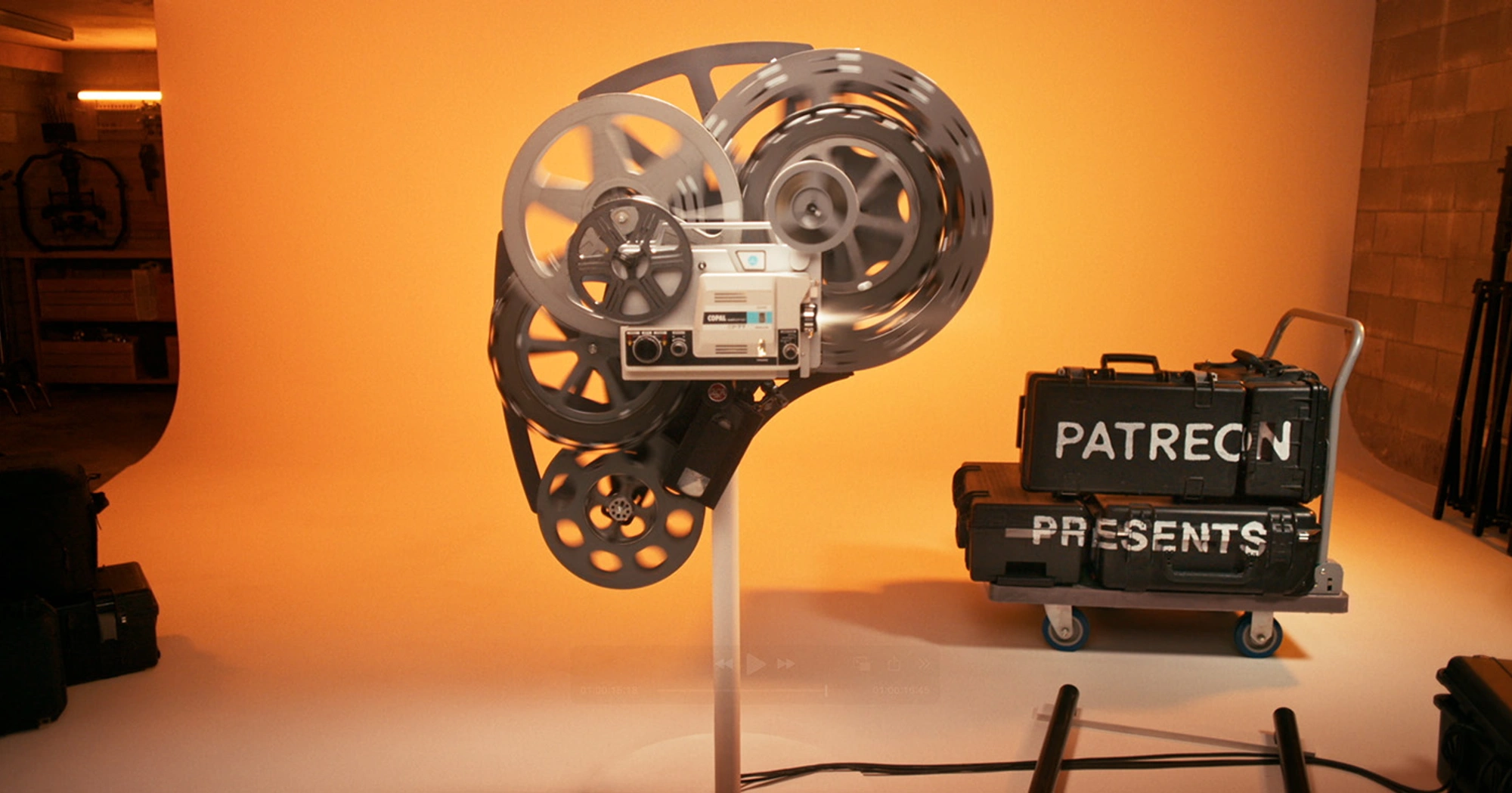Patreon logo made up of old projector parts