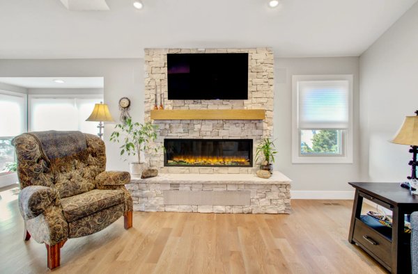 Modern Fireplace Feature by Stewart Remodel Design Build