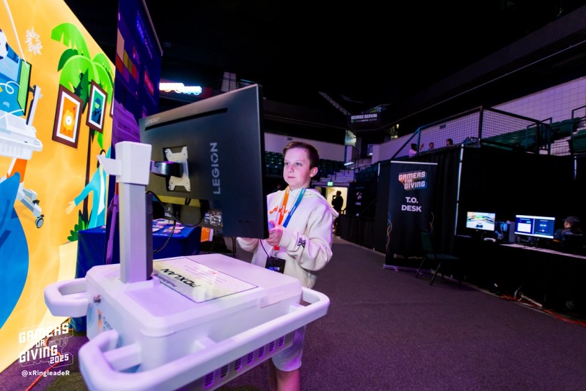 A boy plays with a GO Kart at GFG