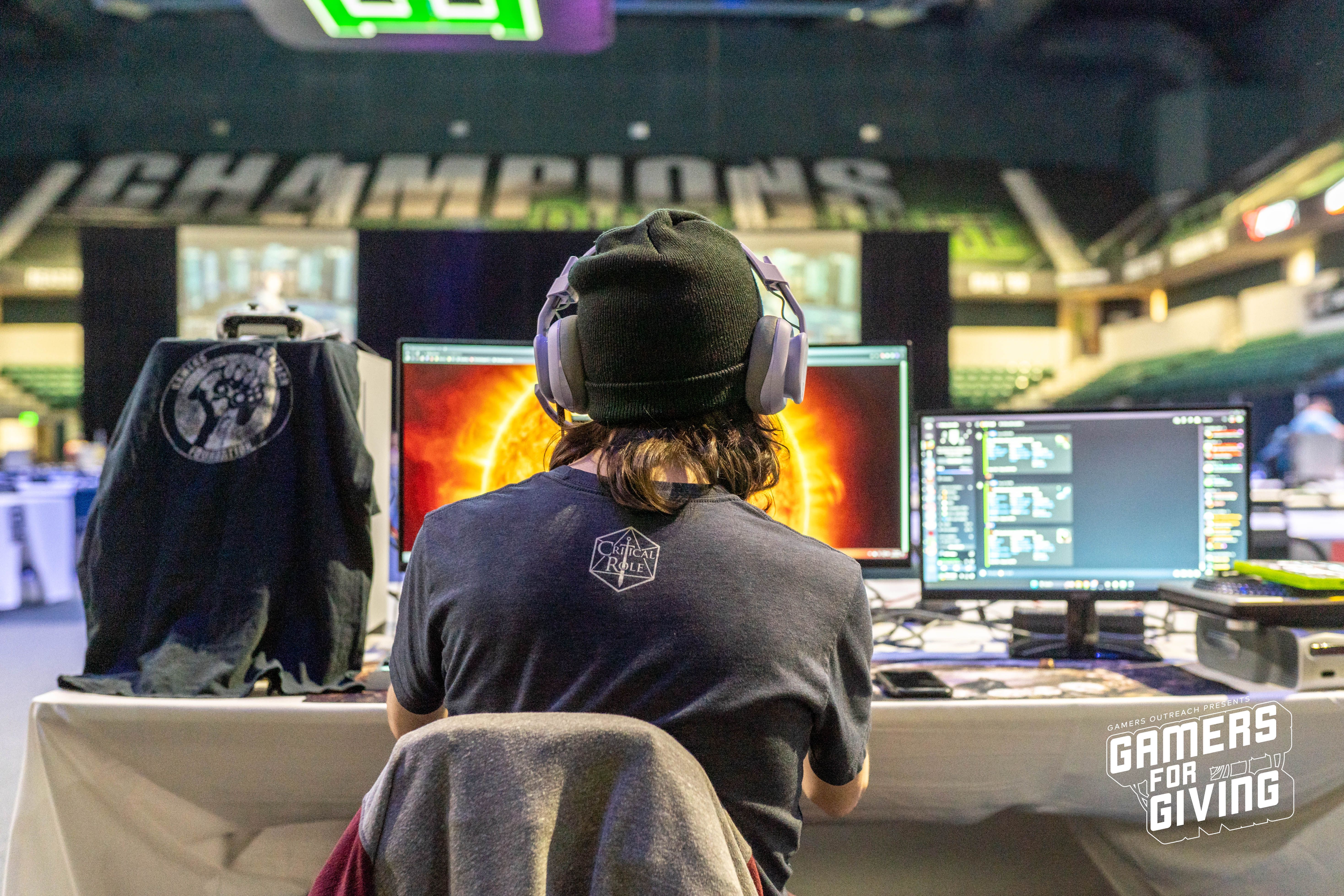 Person at a BYOC LAN setup on Day 1 of the Gamers for Giving 2023 LAN party.