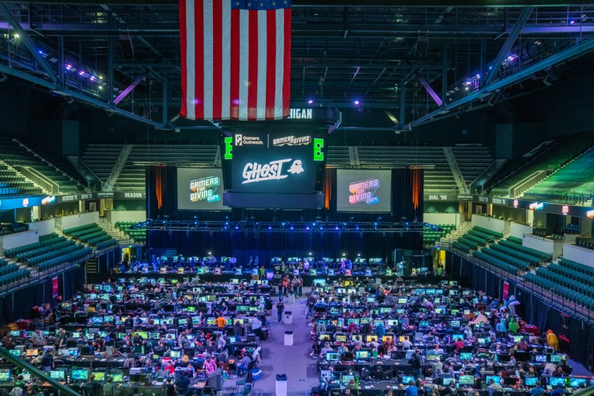 Photo of the LAN area at Gamers for Giving 2024 with hundreds of gamers set up in rows with their gaming systems at the George Gervin GameAbove Center at Eastern Michigan University.