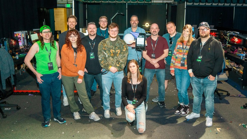 Hermits and community in a group photo at Gamers for Giving 2024.