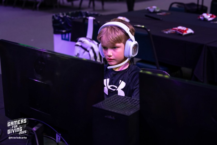 A child locked in on his game.