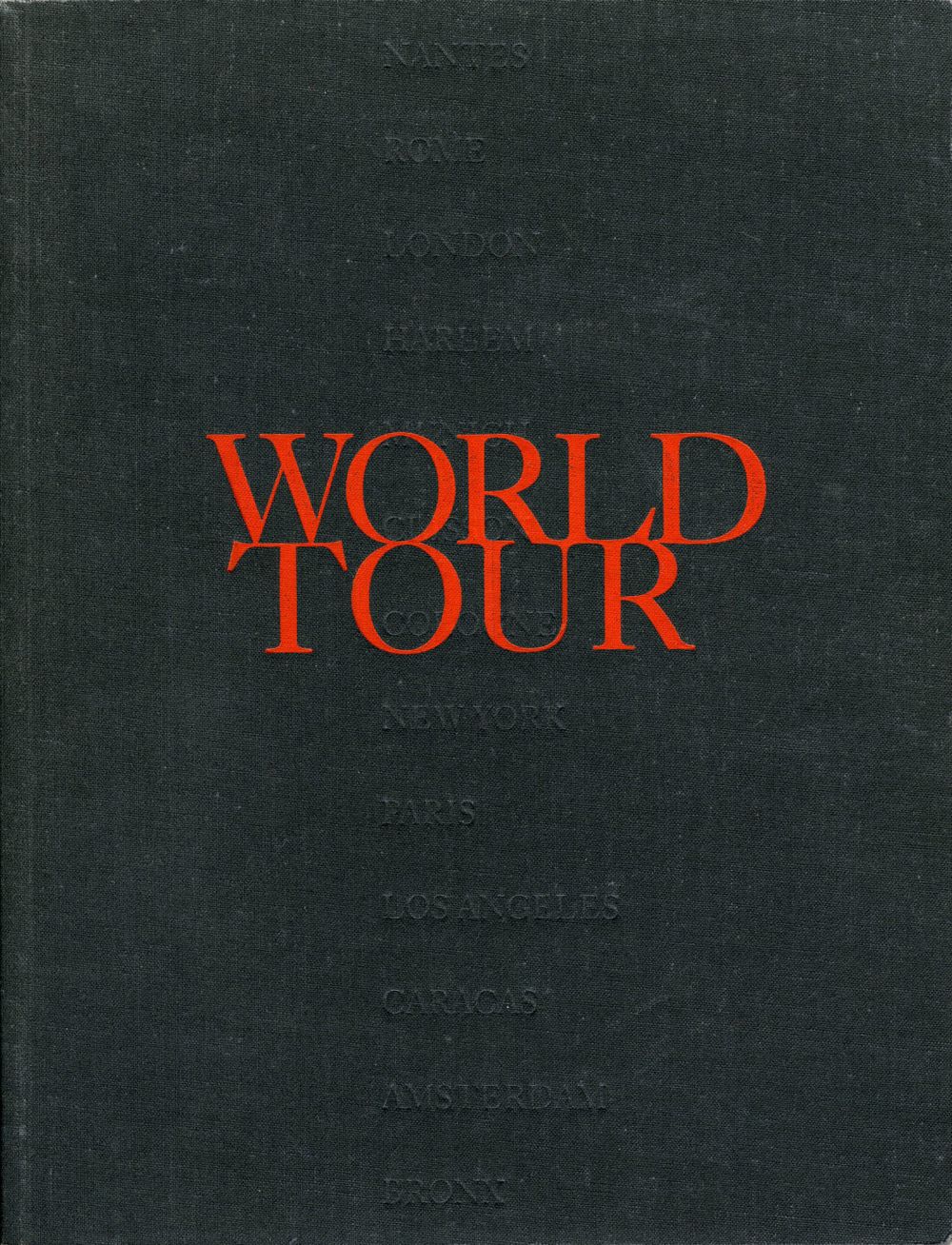 Book cover on plain gray background with title of World Tour