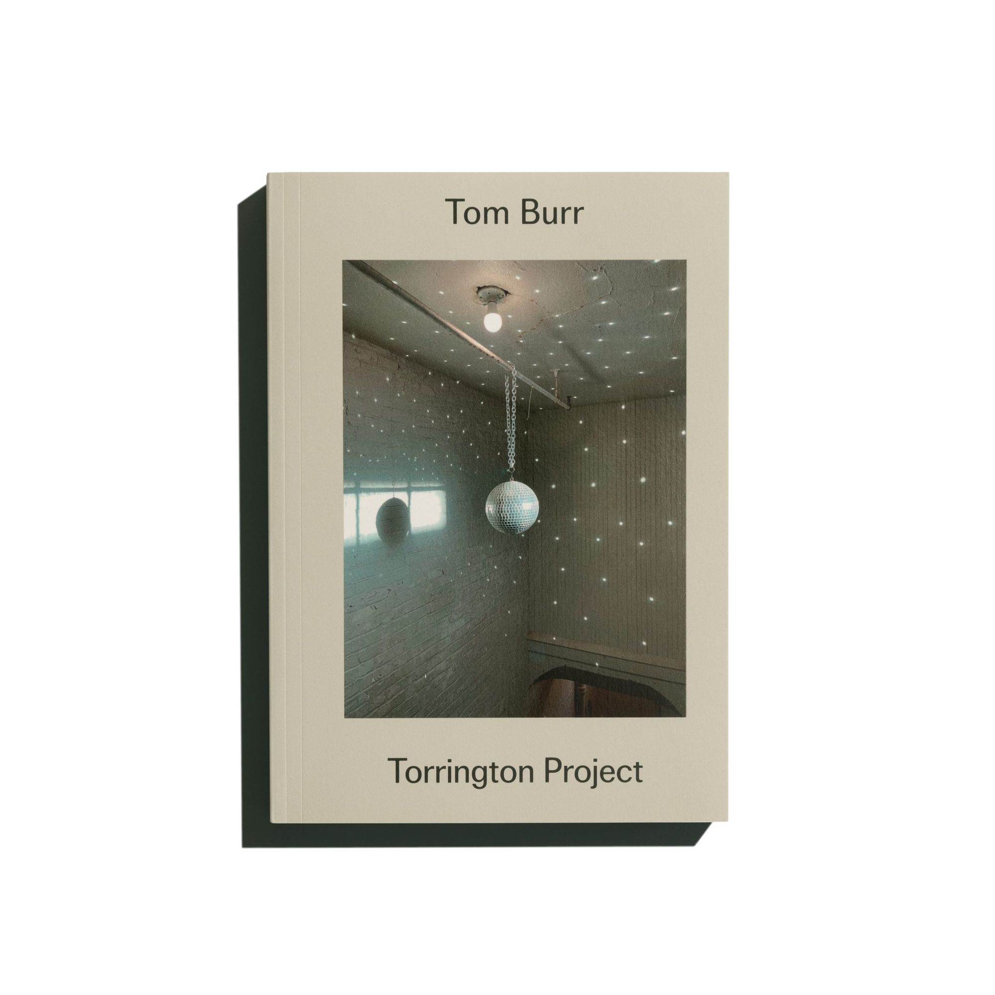 Book cover on plain background with title of Torrington Project
