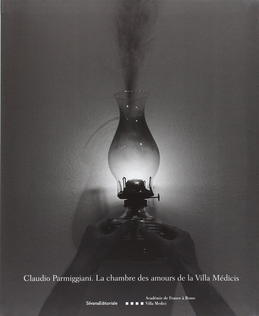 Book cover on plain gray background with title of Claudio Parmiggiani: La chambre des amours de la Villa Médicis
