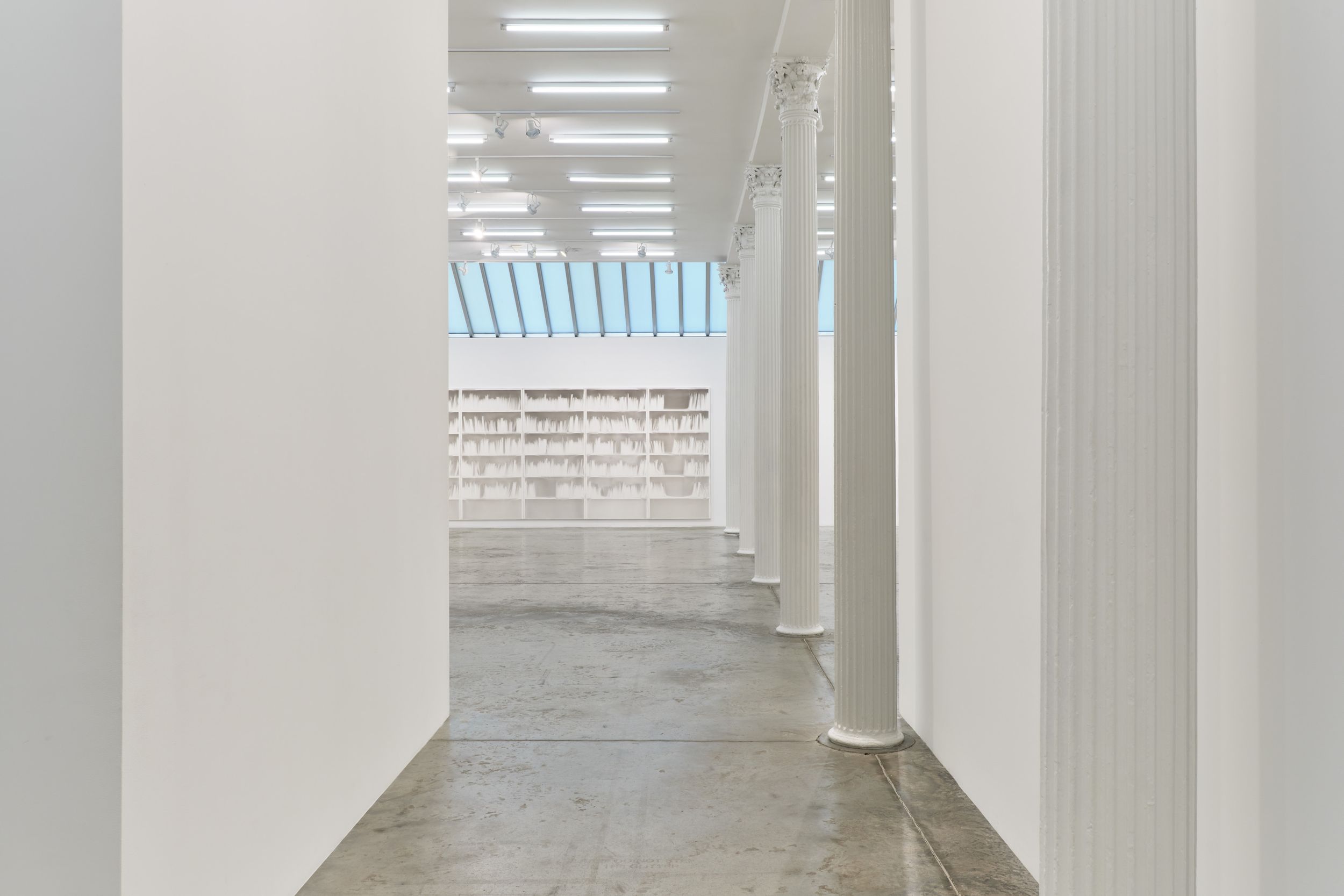 Installation view of Felt, Velvet, Soot, Gypsum, Engine Oil