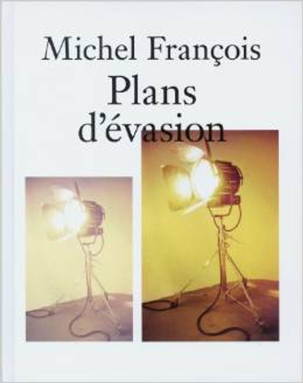 Book cover on plain gray background with title of Plans d’Evasion