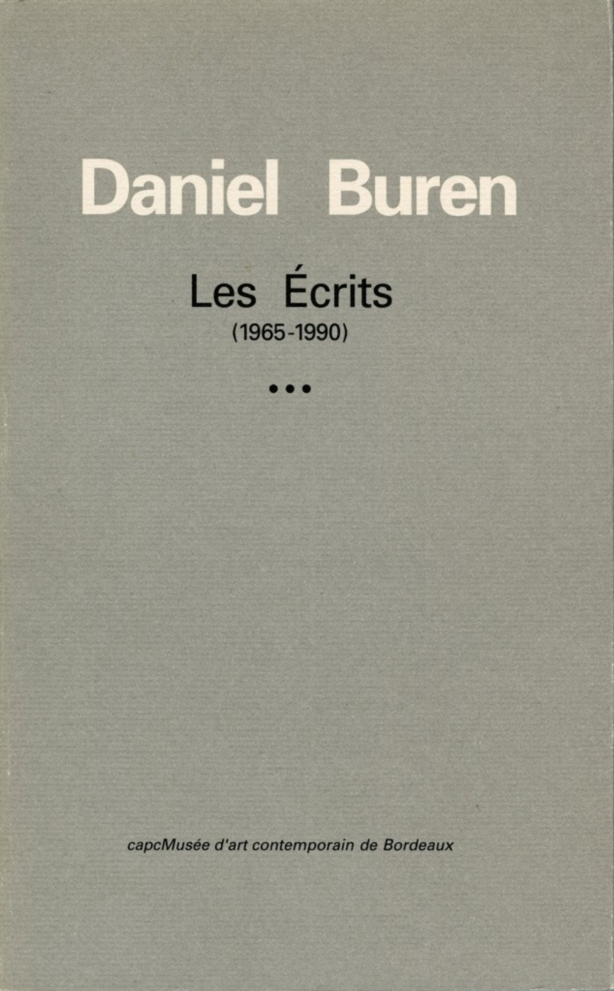 Detail view of Les Ecrits (1965-1990) against a plain gray background