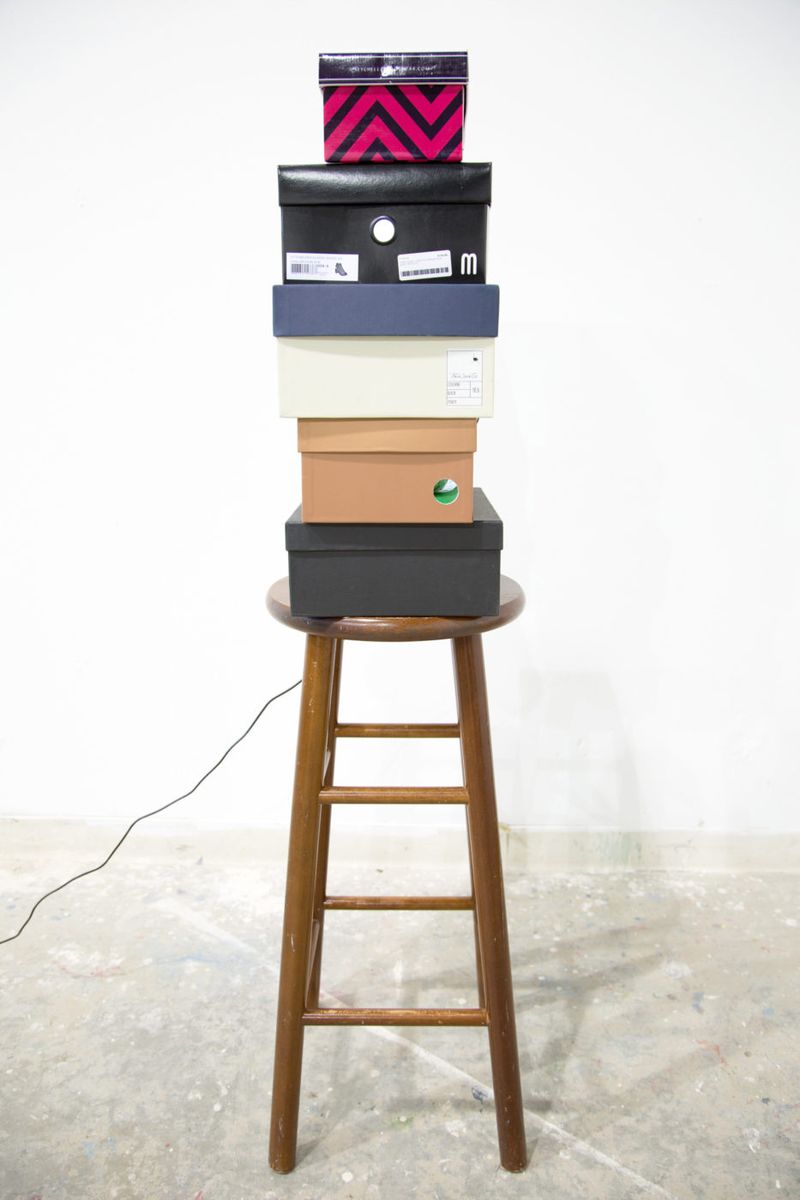 Installation view of displayed artwork titled Shoelightbox #5