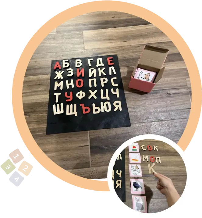 Подредени букви до отворена розова кутия