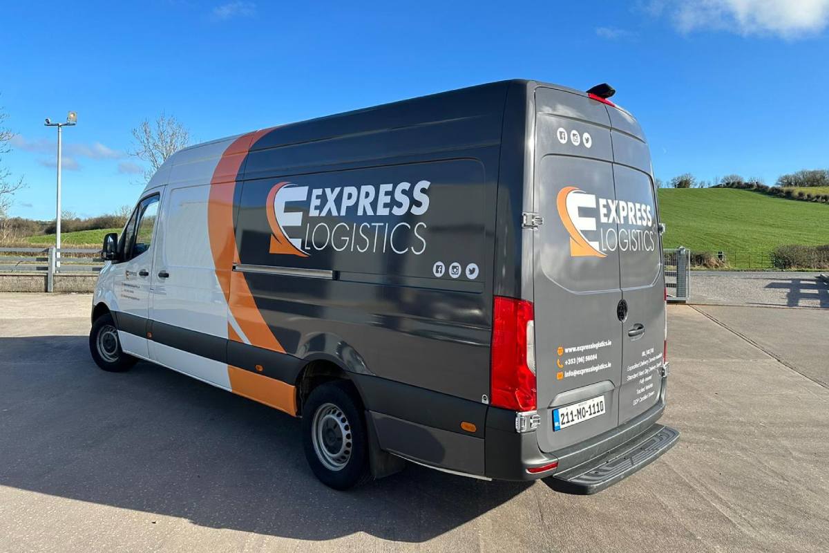 A grey and white Express Logistics last mile delivery van 