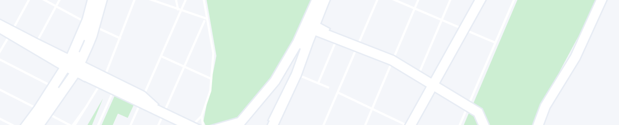 Minimalist map with light grey streets and subtle green areas.