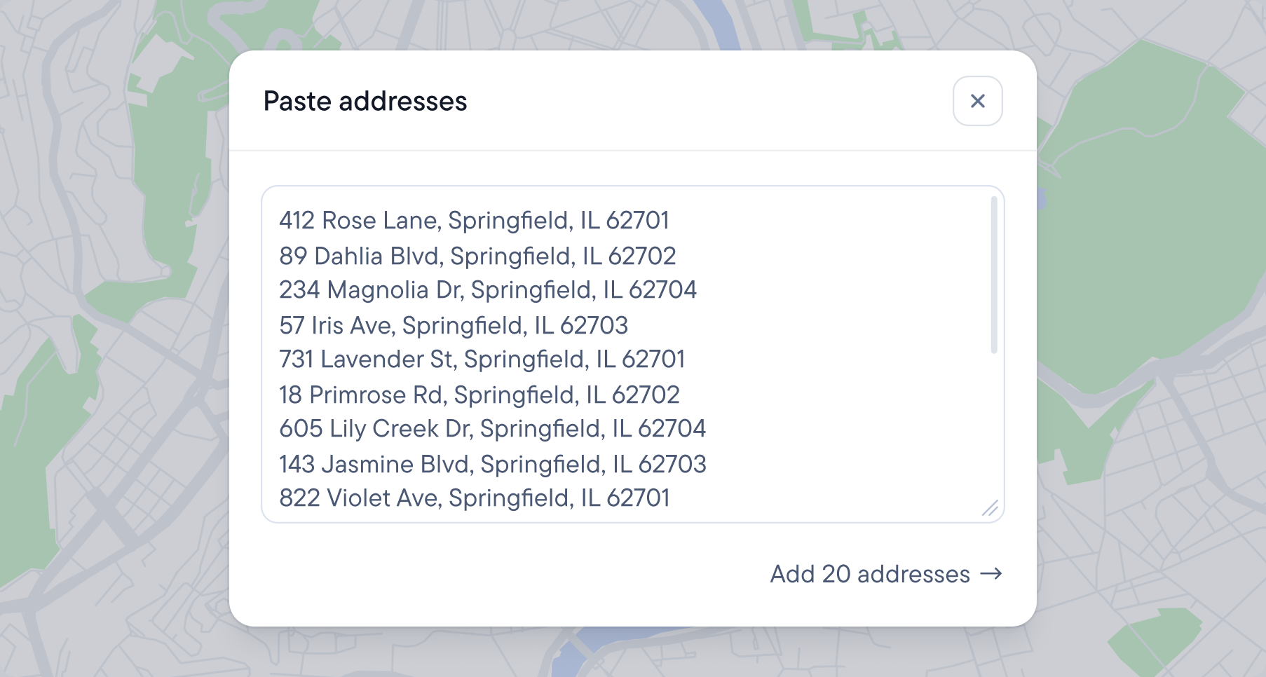 A "Paste addresses" dialog box showing a list of addresses and an "Add 20 addresses" button on a map background.