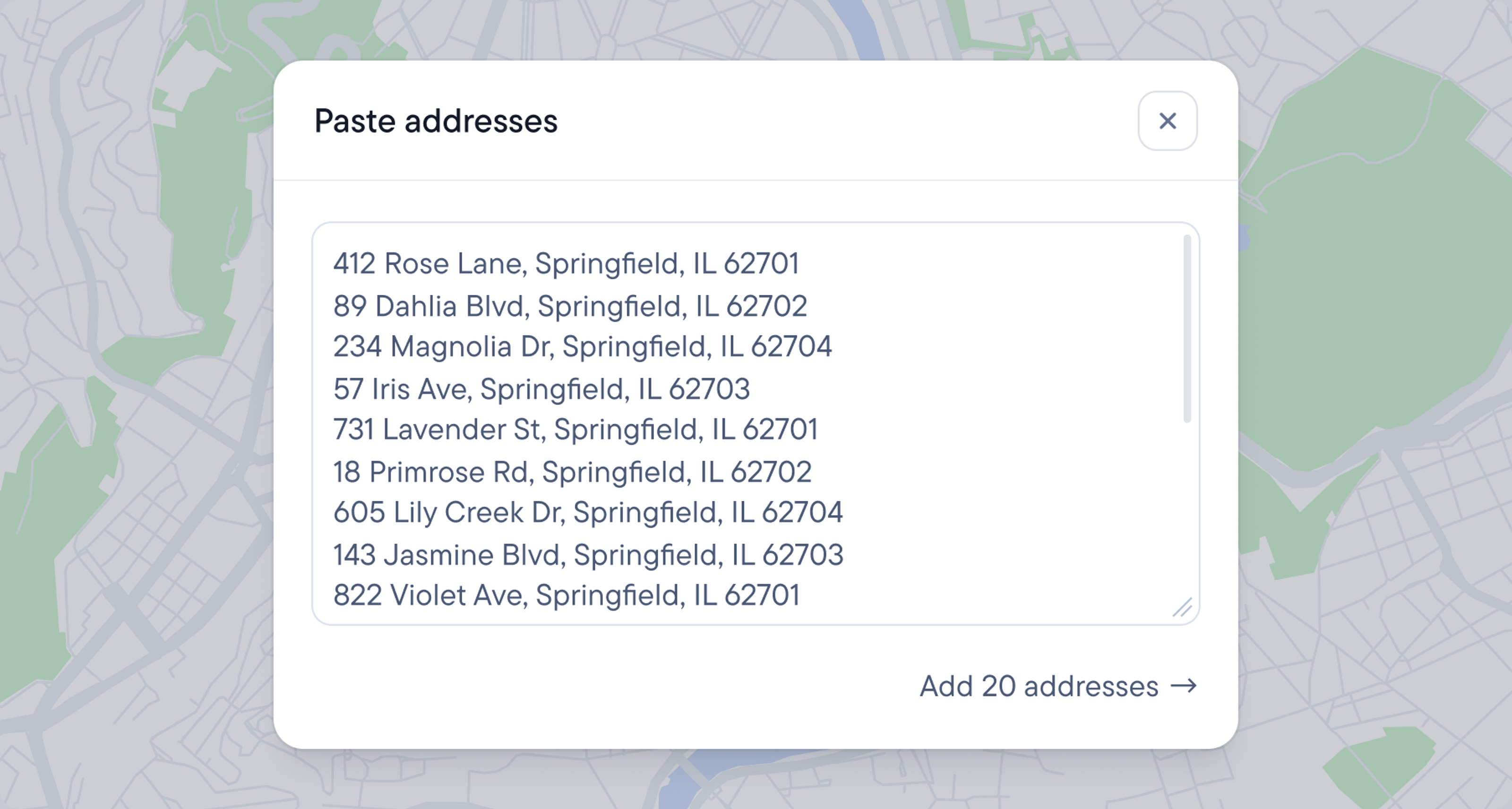 A "Paste addresses" dialog box showing a list of addresses and an "Add 20 addresses" button on a map background.