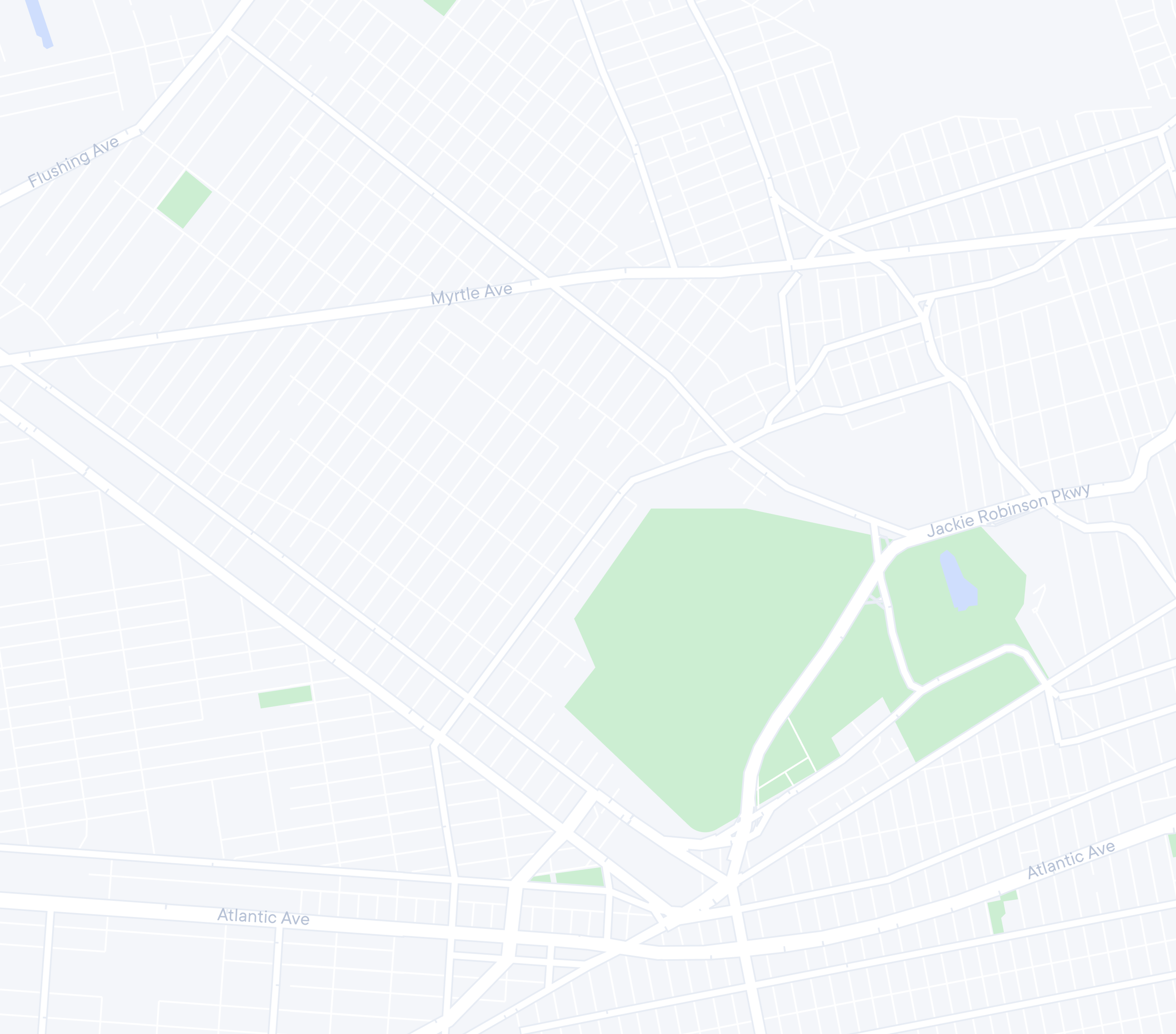 Map showing streets, parks, and a pond, with roads