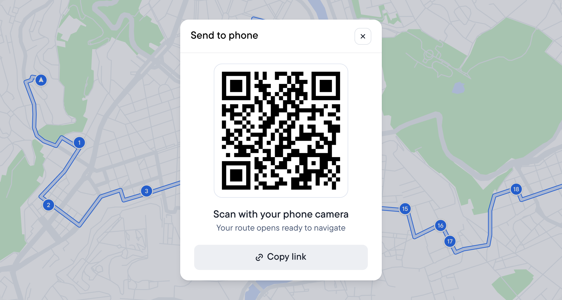 A map displaying a route with a "Send to phone" pop-up showing a QR code.