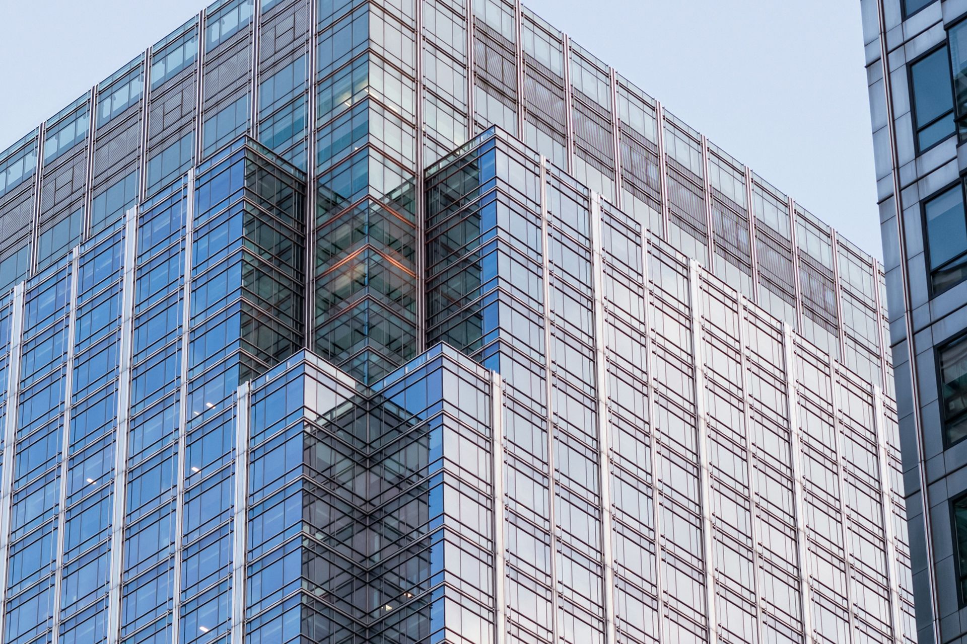 Modern building with a reflective glass facade.