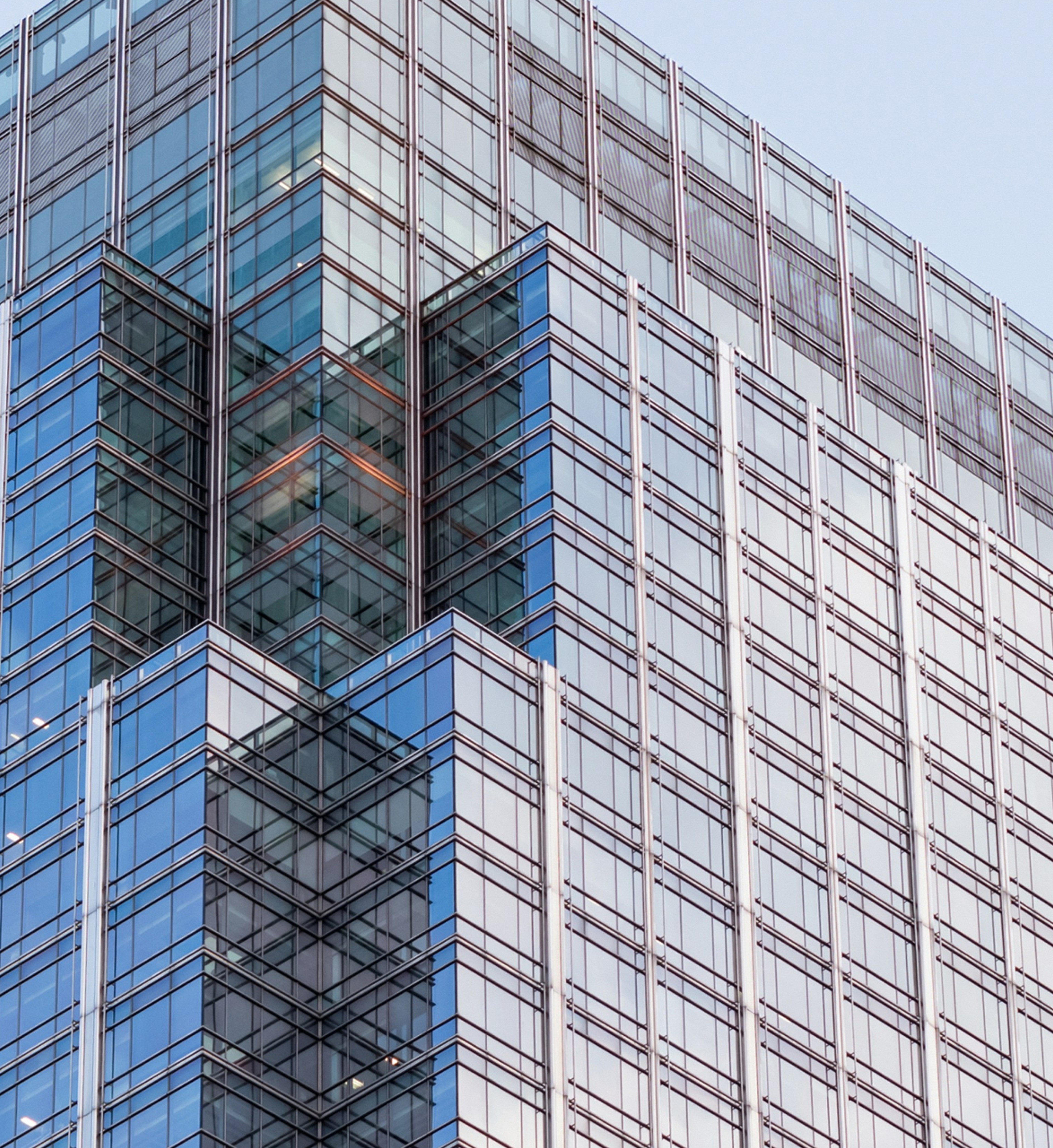 Modern building with a reflective glass facade.