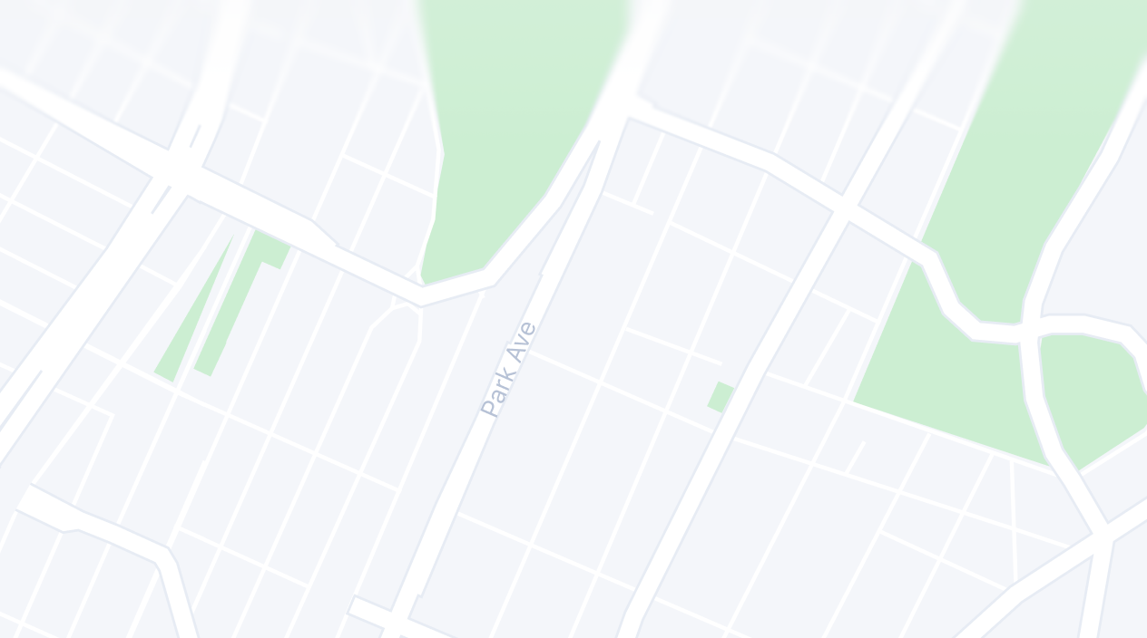A minimalist map of a city showing Park Avenue, streets, and green spaces.