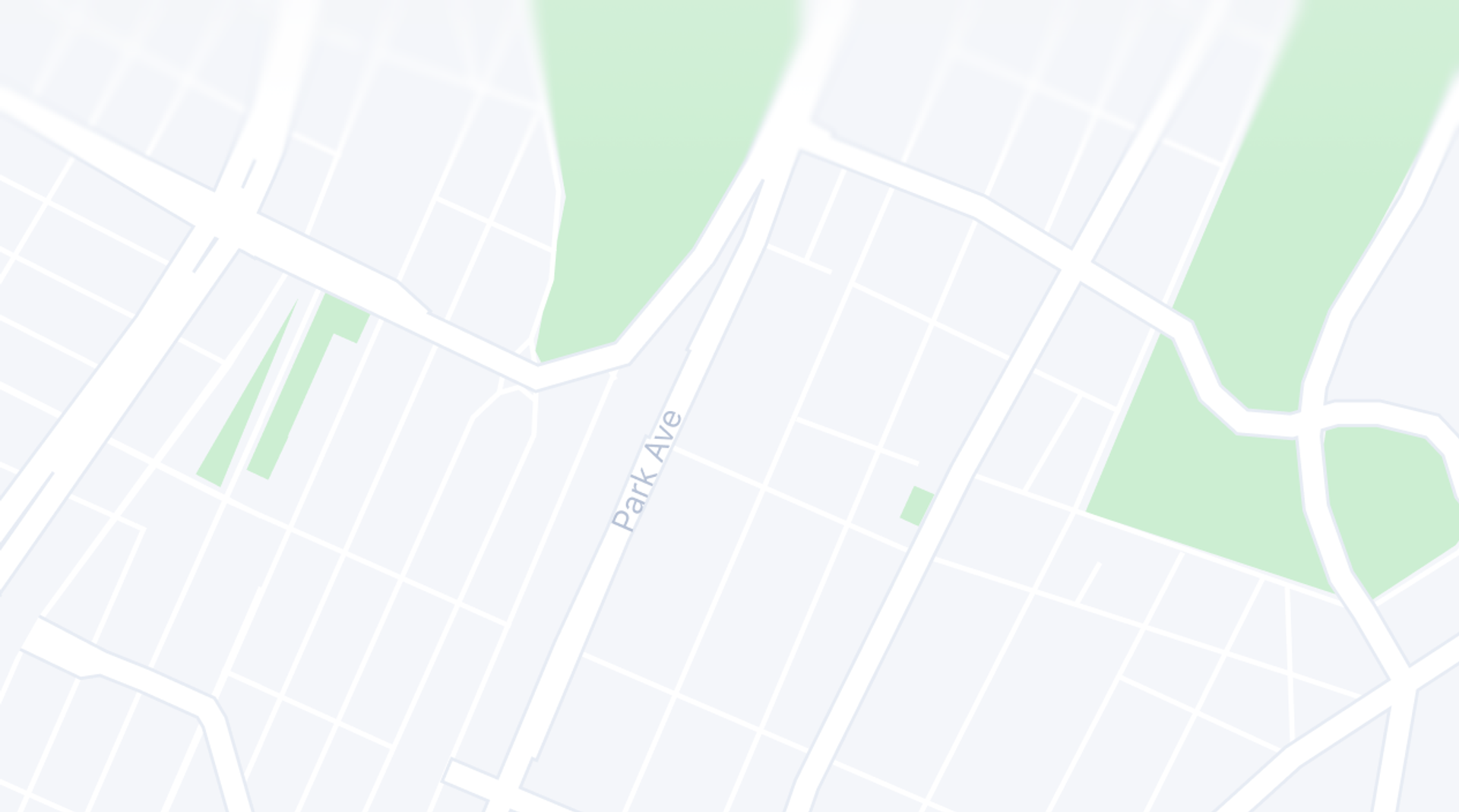 A minimalist map of a city showing Park Avenue, streets, and green spaces.