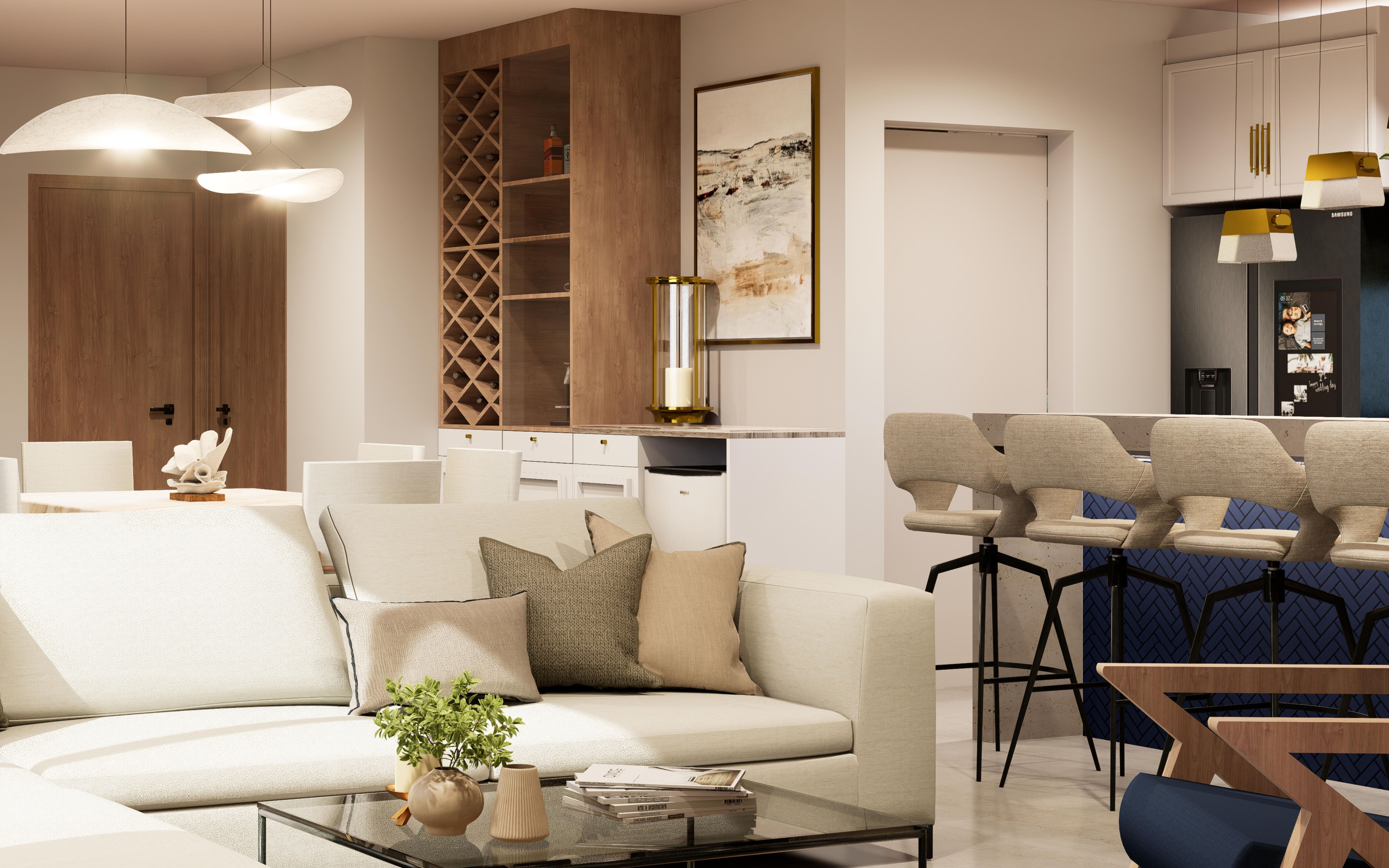 Open-plan living room in warm neutrals with a cream sofa, a built-in wine rack and a kitchen island with navy stools.