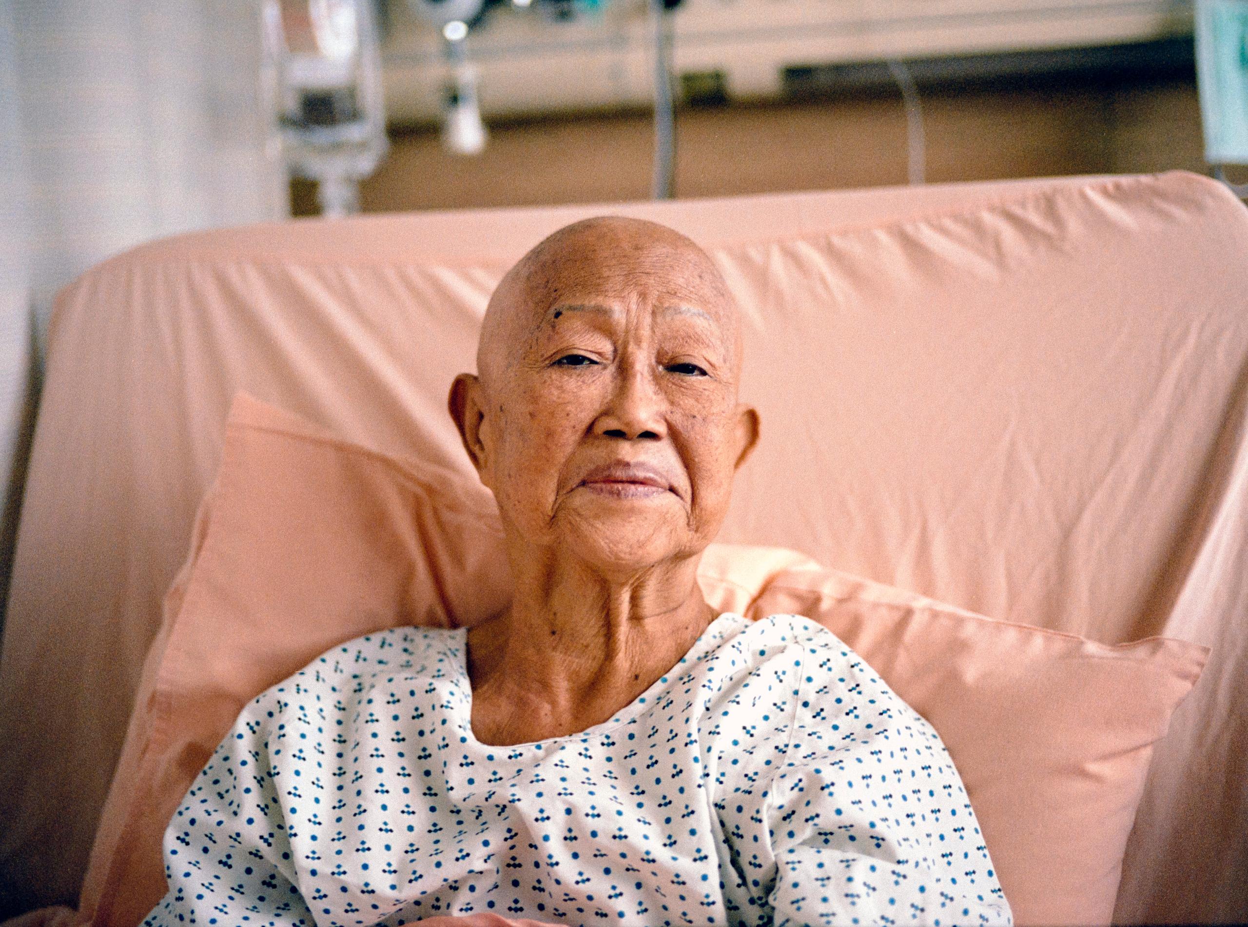 A poignant image of the artist's mother in hospice, captured on Leica M6 with Kodak Portra 400, symbolizing grief and acceptance.