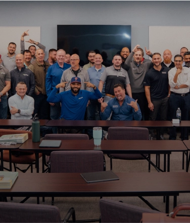 RBA employees standing with an award
