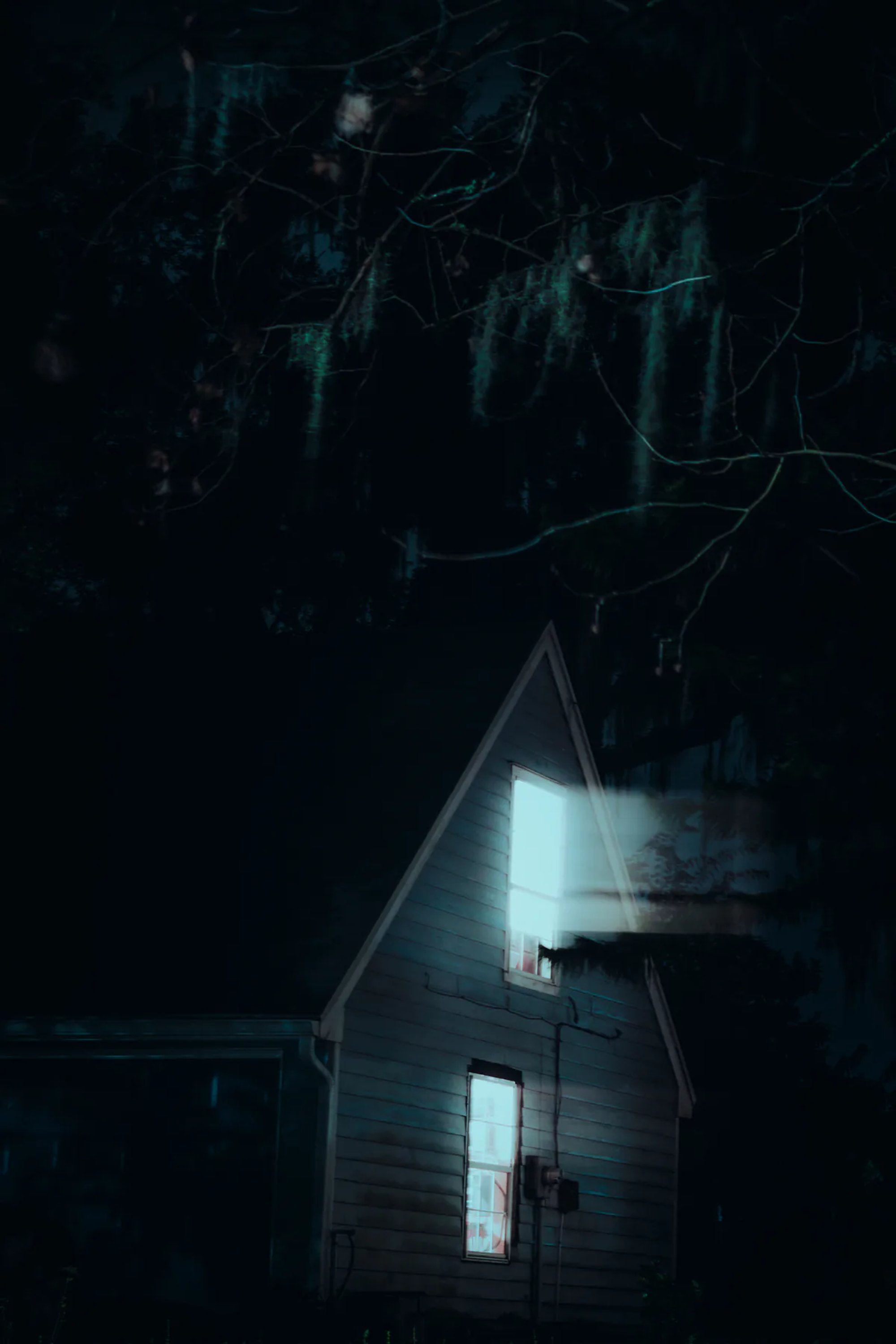 Small church building lit by a bright exterior light at night.