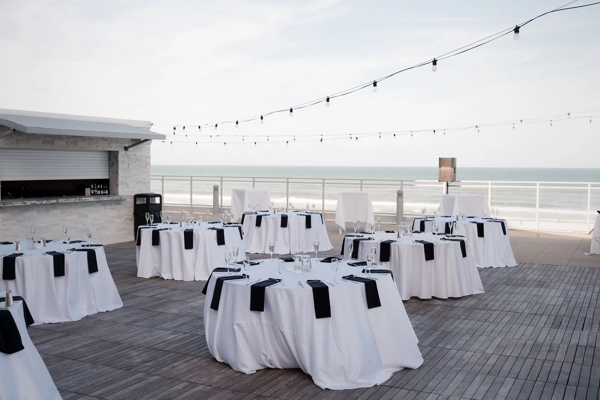 Outdoor wedding reception setup on the deck at Hard Rock Hotel Daytona Beach.