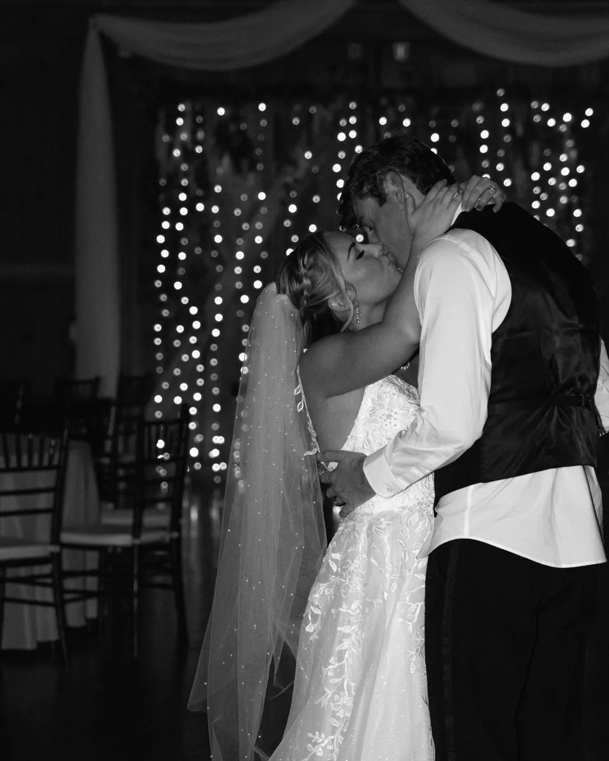 Black and white bride and groom dancing at wedding reception in DeLand Florida