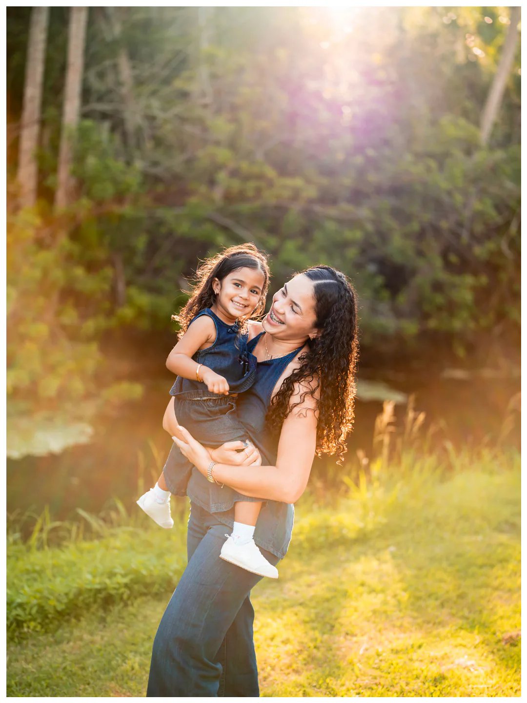 Mother and daughter photos at Buschman Park in Port Orange with warm lens flare