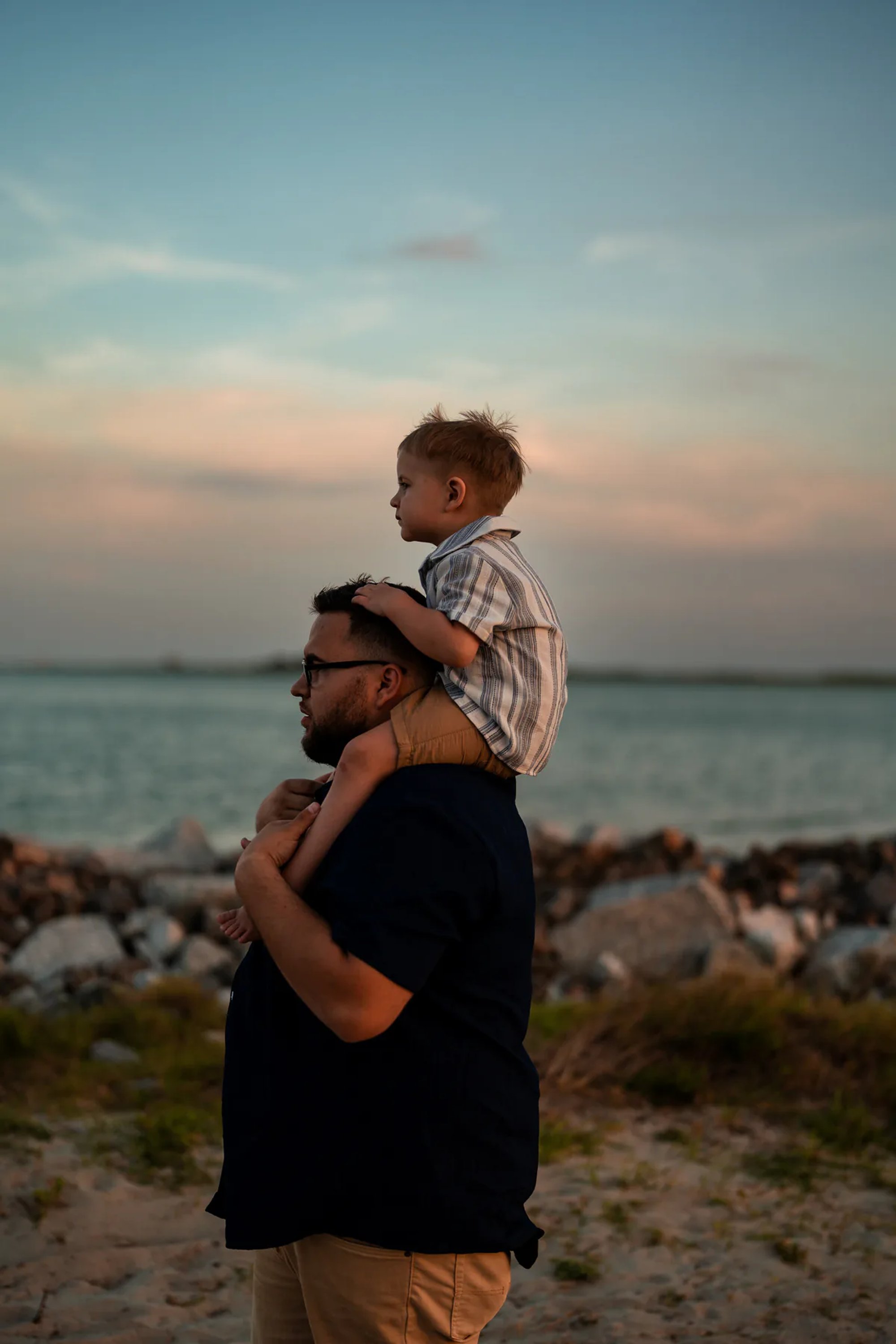 Father and son beach portrait near the water at Ponce Inlet Florida