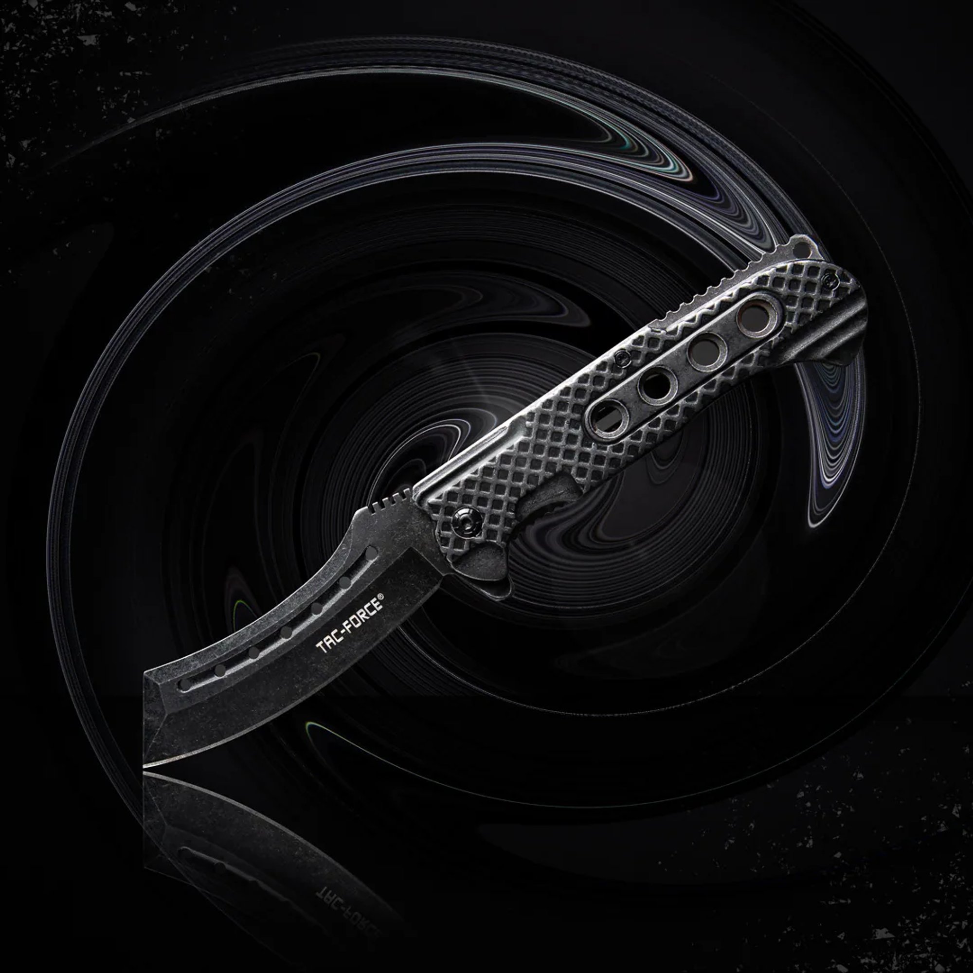 Folding pocketknife arranged on a black concentric background.