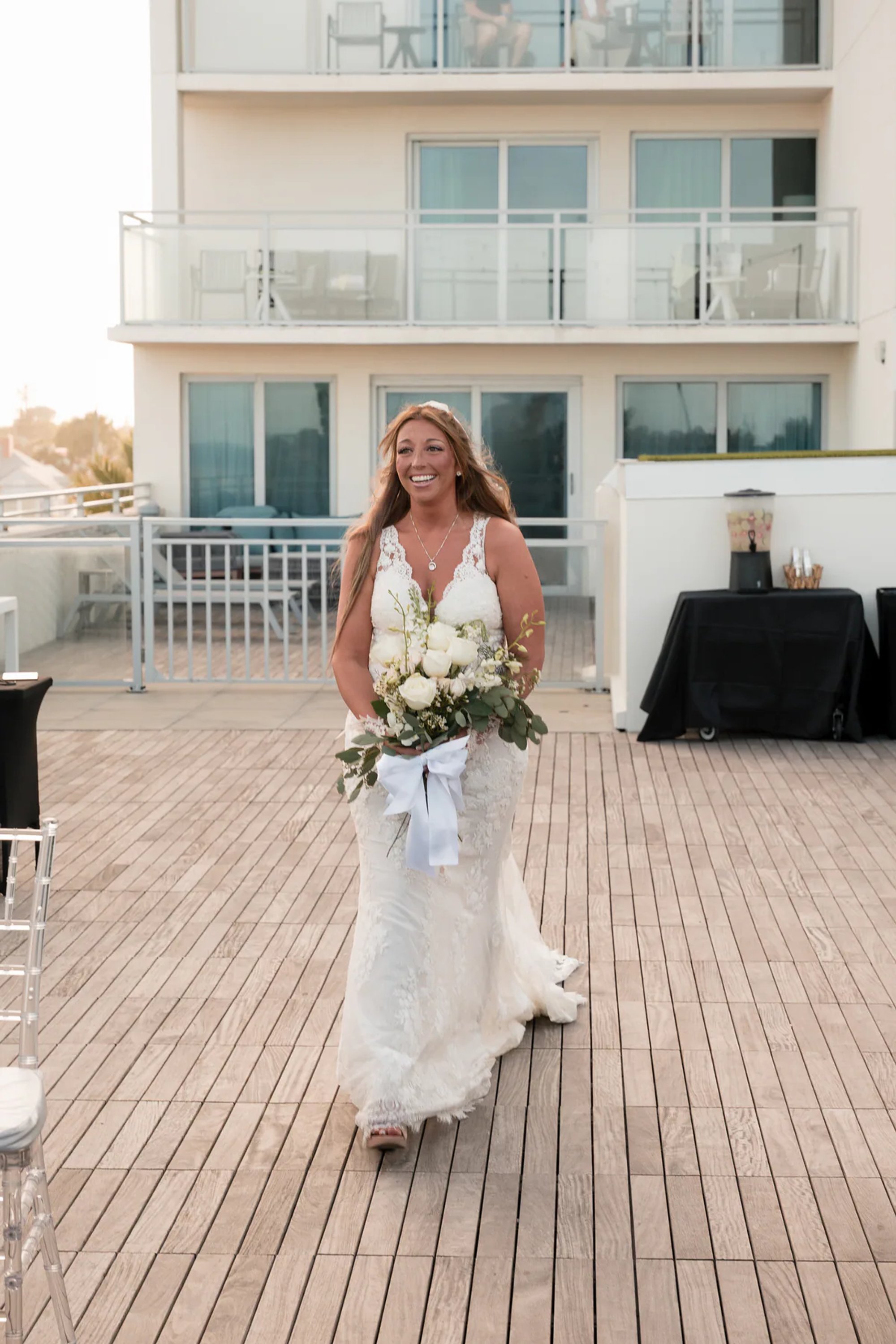 Bride walking with her bouquet before the ceremony at Hard Rock Hotel Daytona Beach.