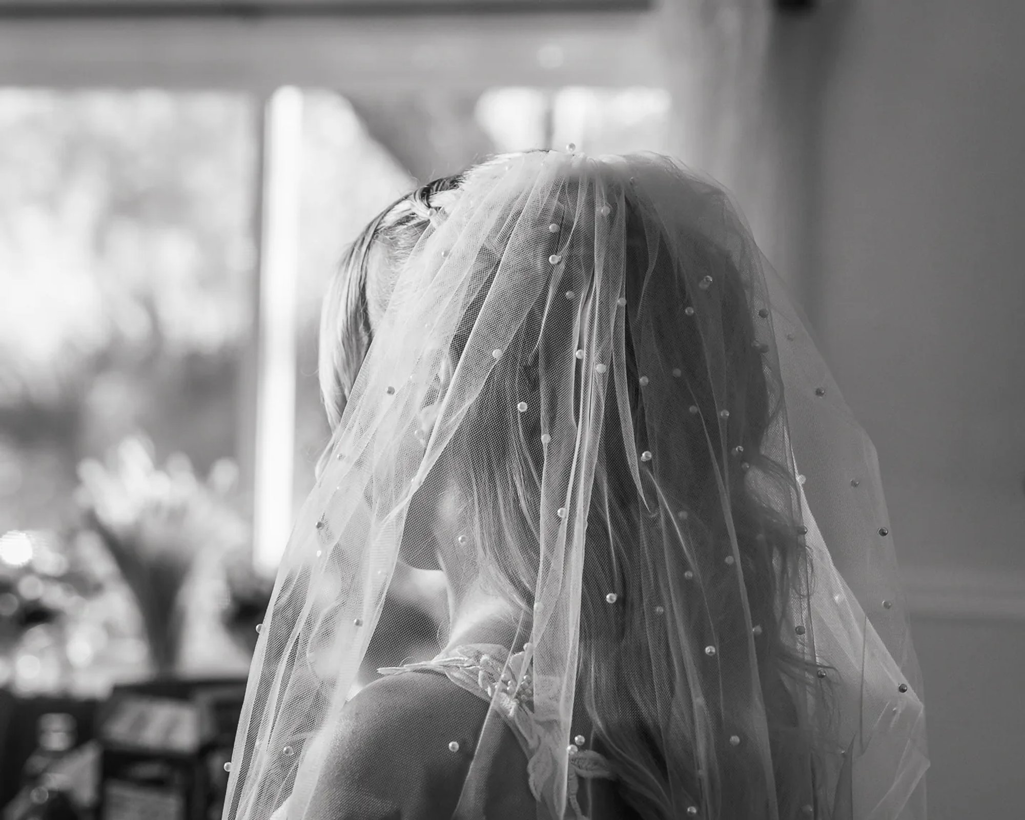 Black and white bridal veil detail photo from Bridle Oaks Barn wedding in DeLand Florida