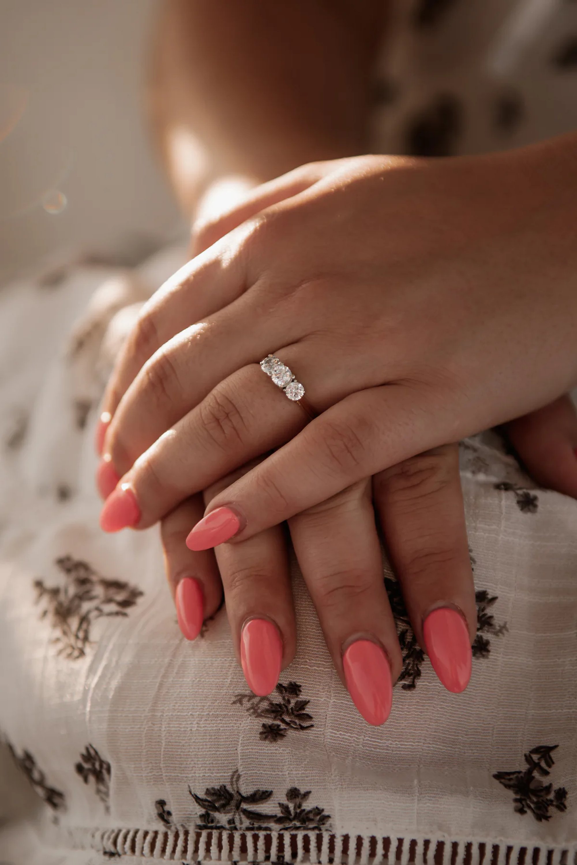 Close-up engagement ring detail photo during Daytona Beach sailboat engagement session