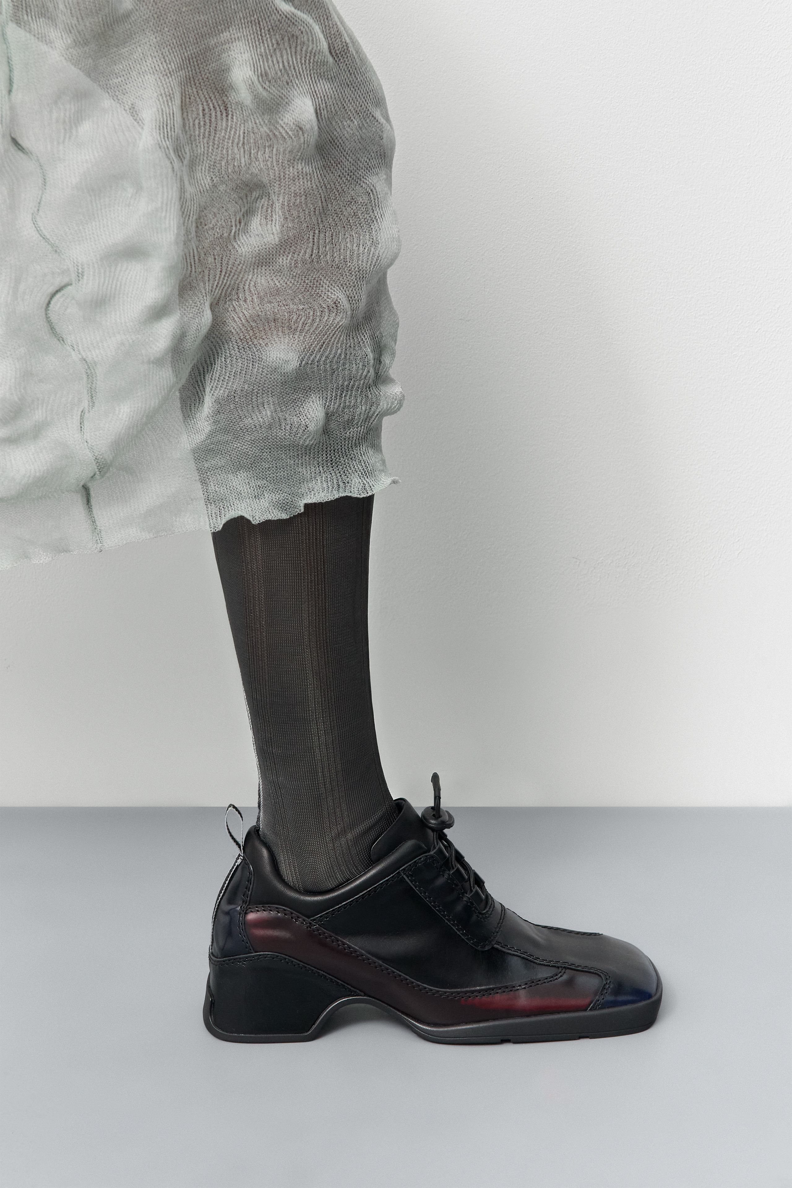 Shila Sneakers - Black Burgundy Brush Off Leather | Miista