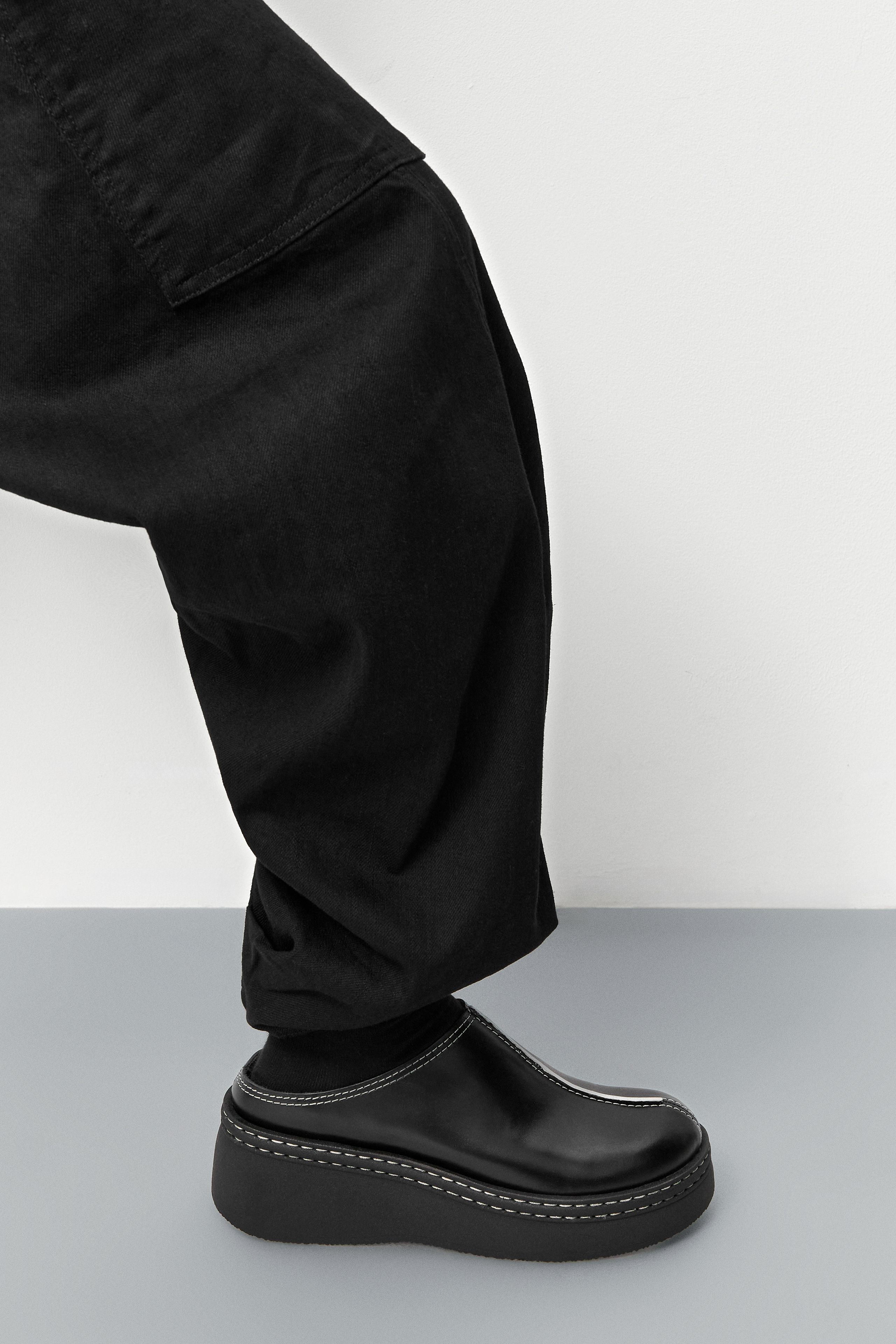 Mego Mules - Black Leather White Stitching | Miista