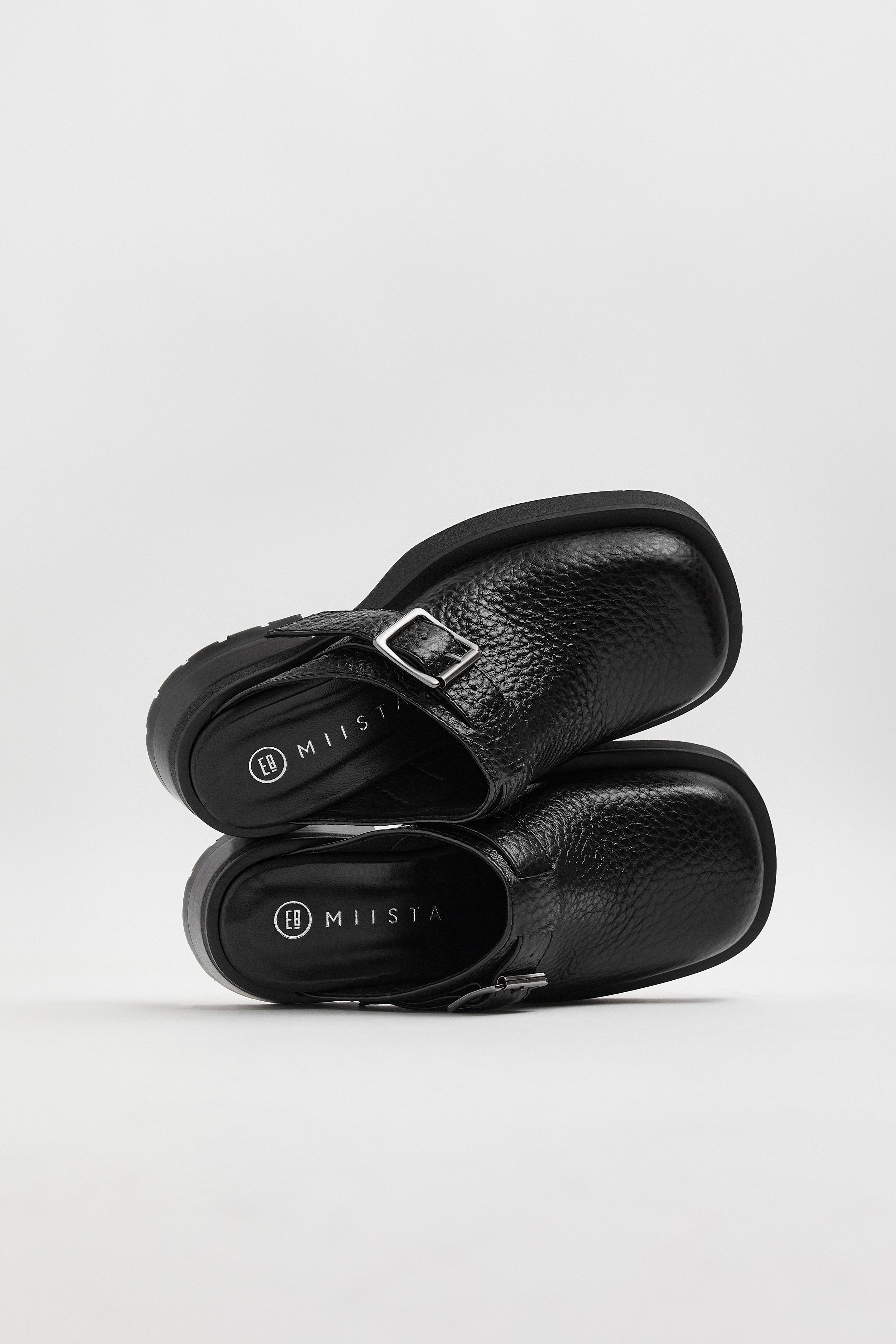Aroa Black Buckled Mules | Miista