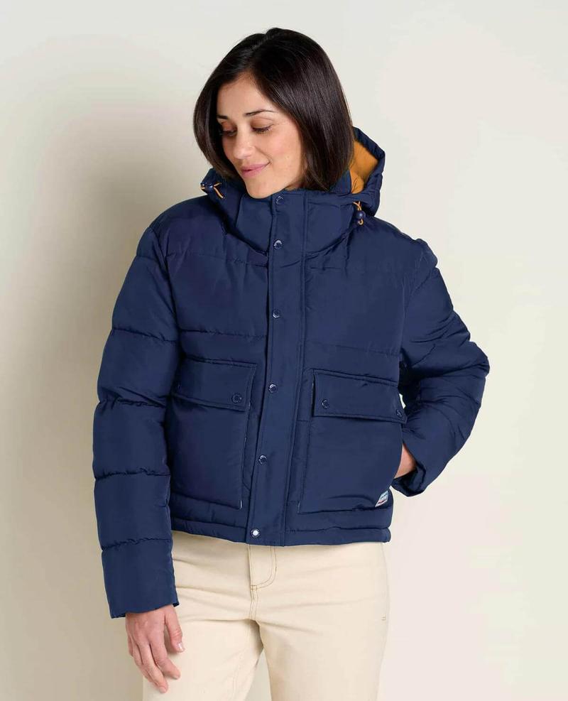 Woman in Toad & co's Spruce Wood Jacket.