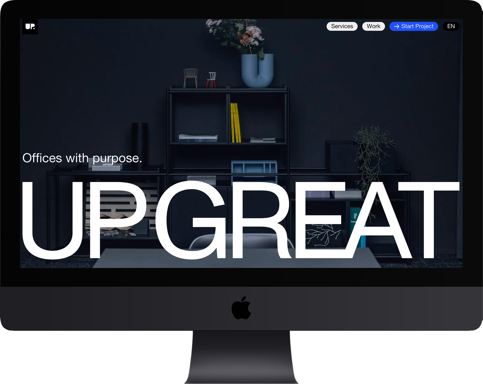 The UP GREAT website on a desktop screen, the wordmark laid over a dark office photograph.