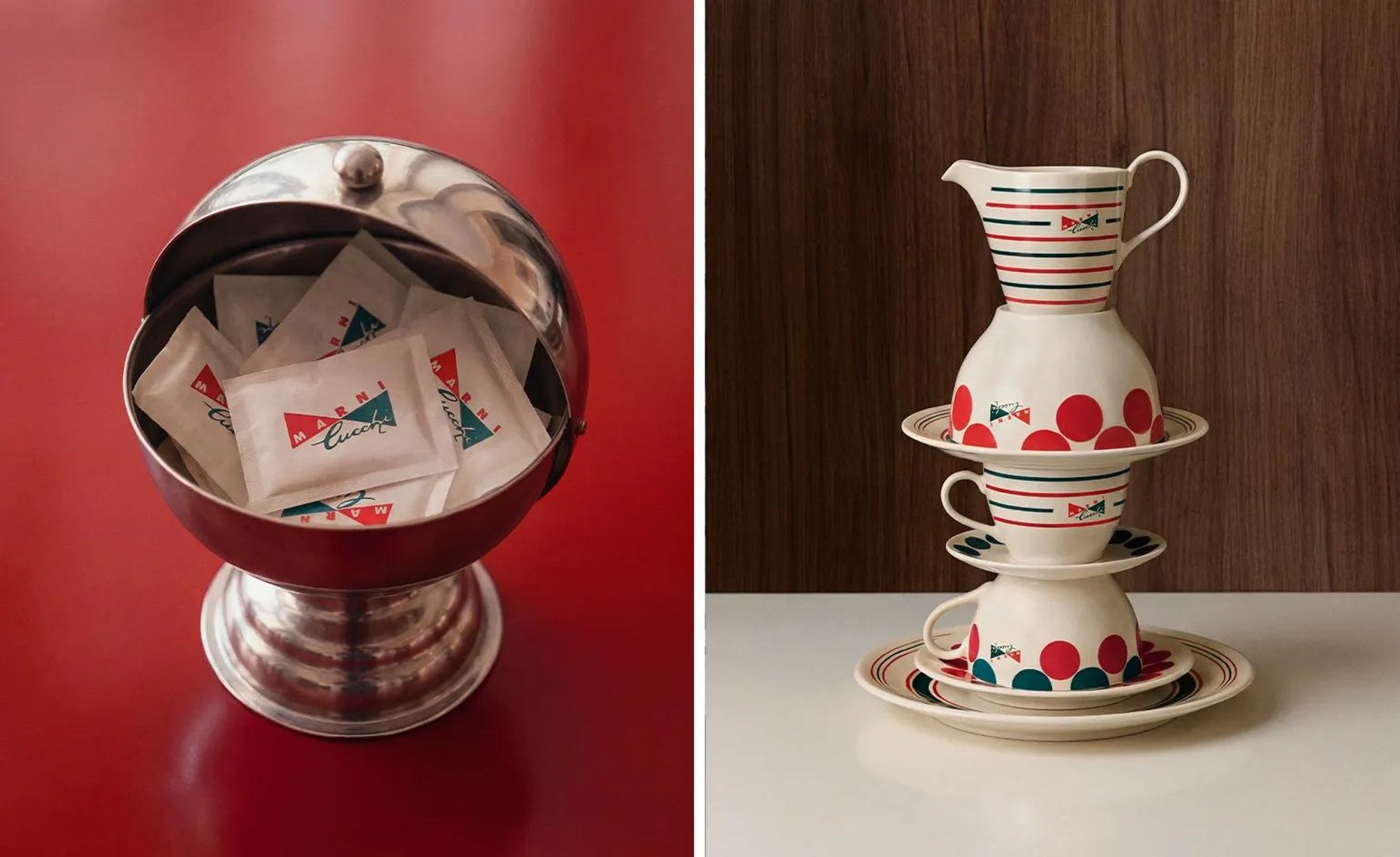 A chrome sphere holding printed napkins, beside a stack of spotted jugs and bowls.