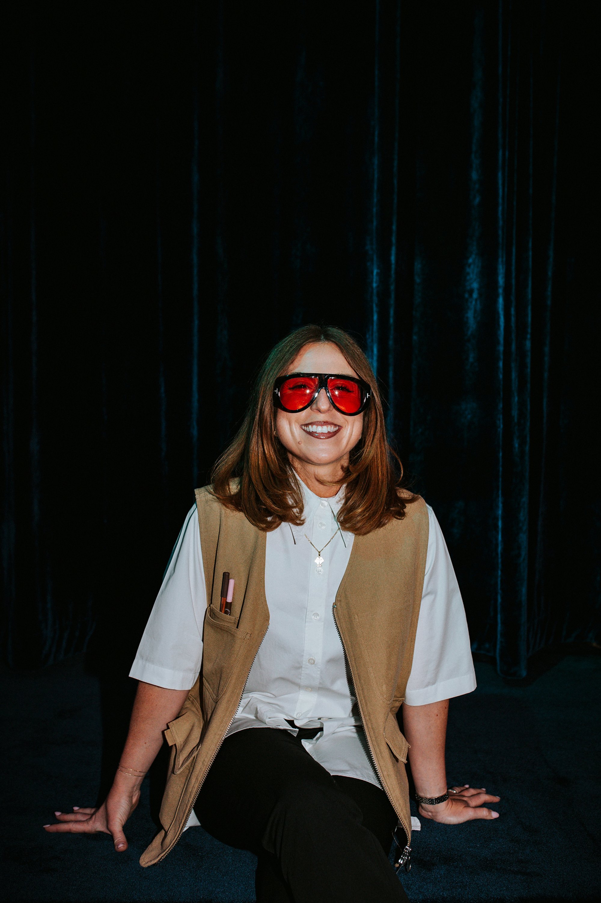 Cecilia sitting on cinema stage