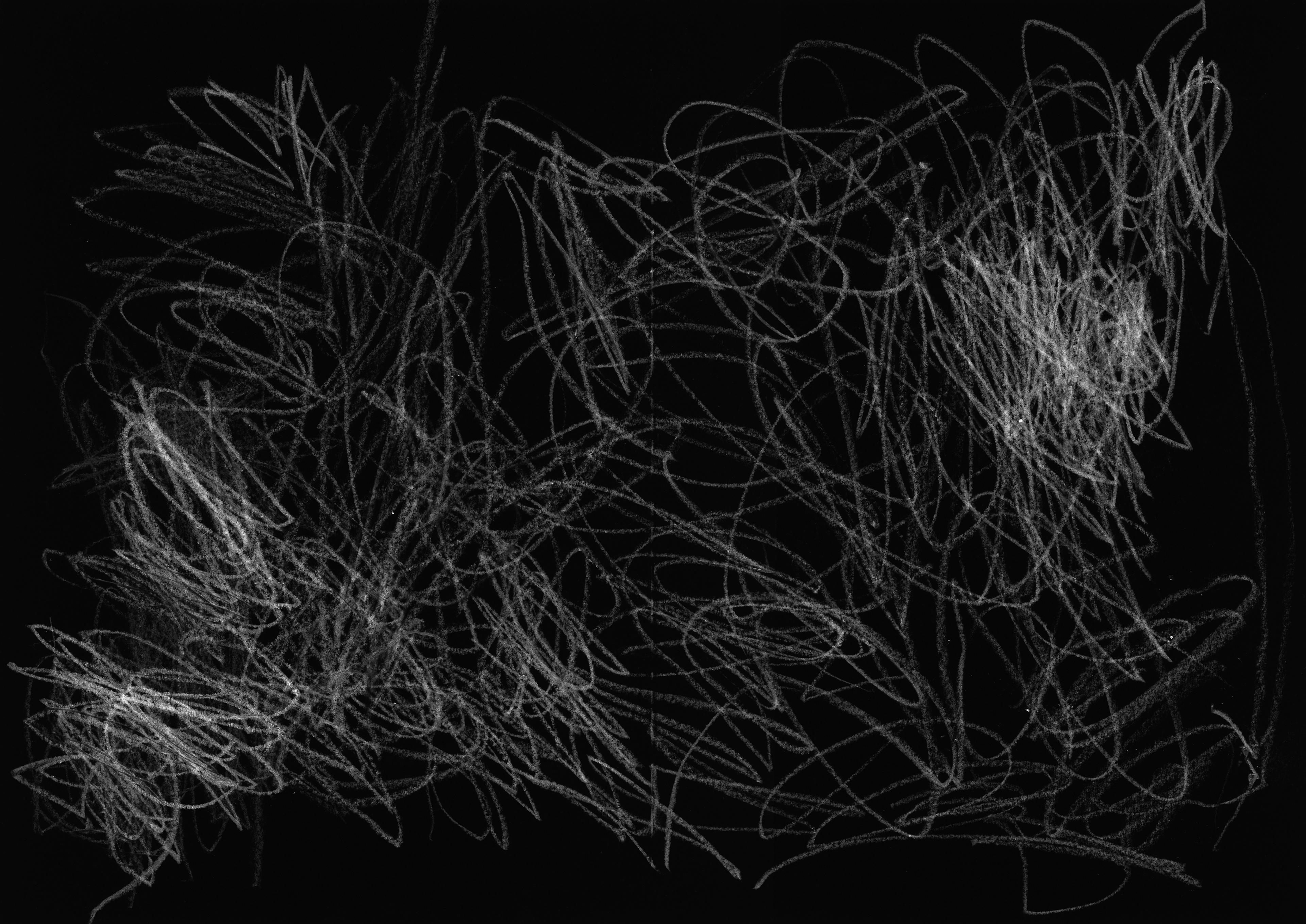 White drawings on a black paper