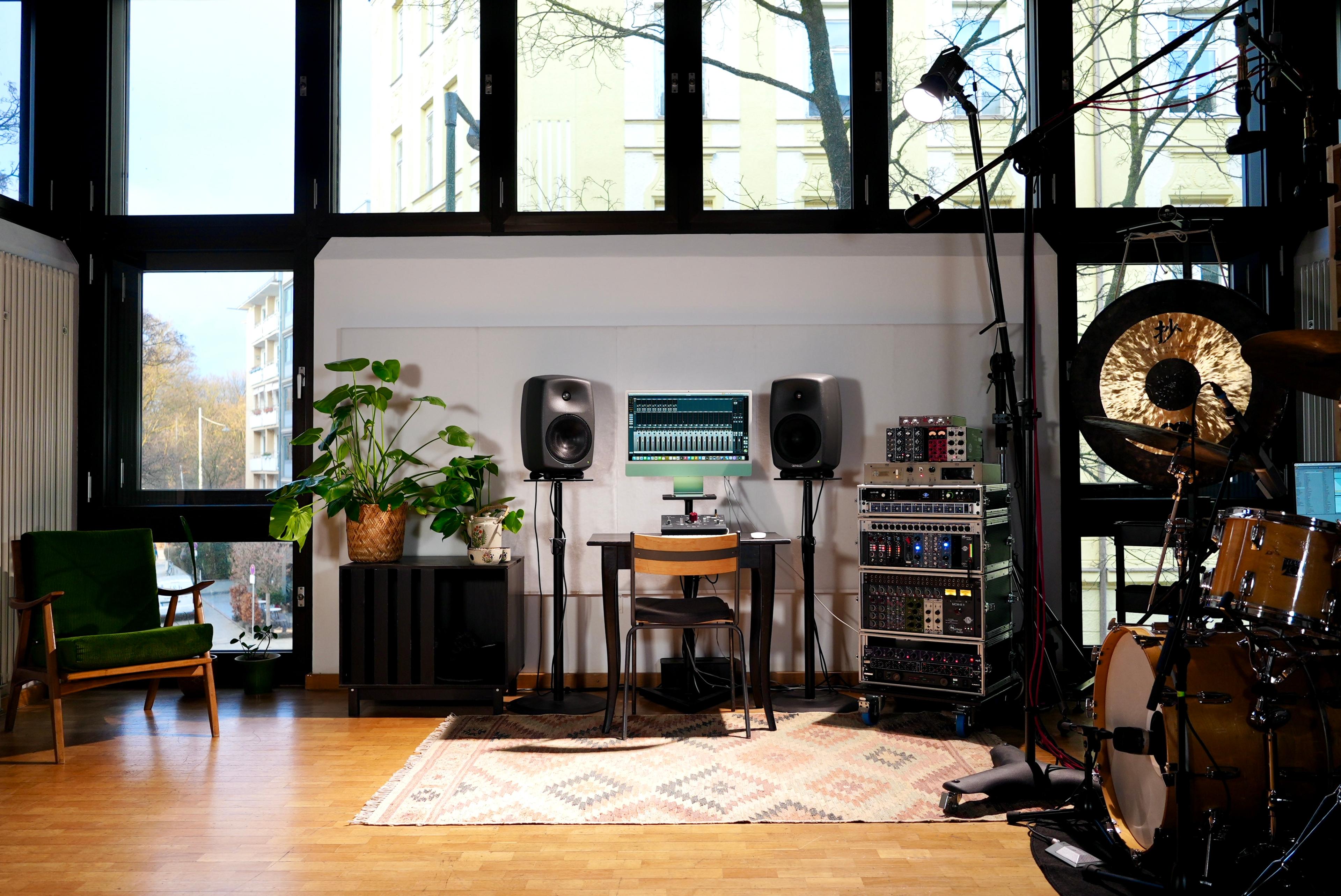 The studio's window-side area with equipment